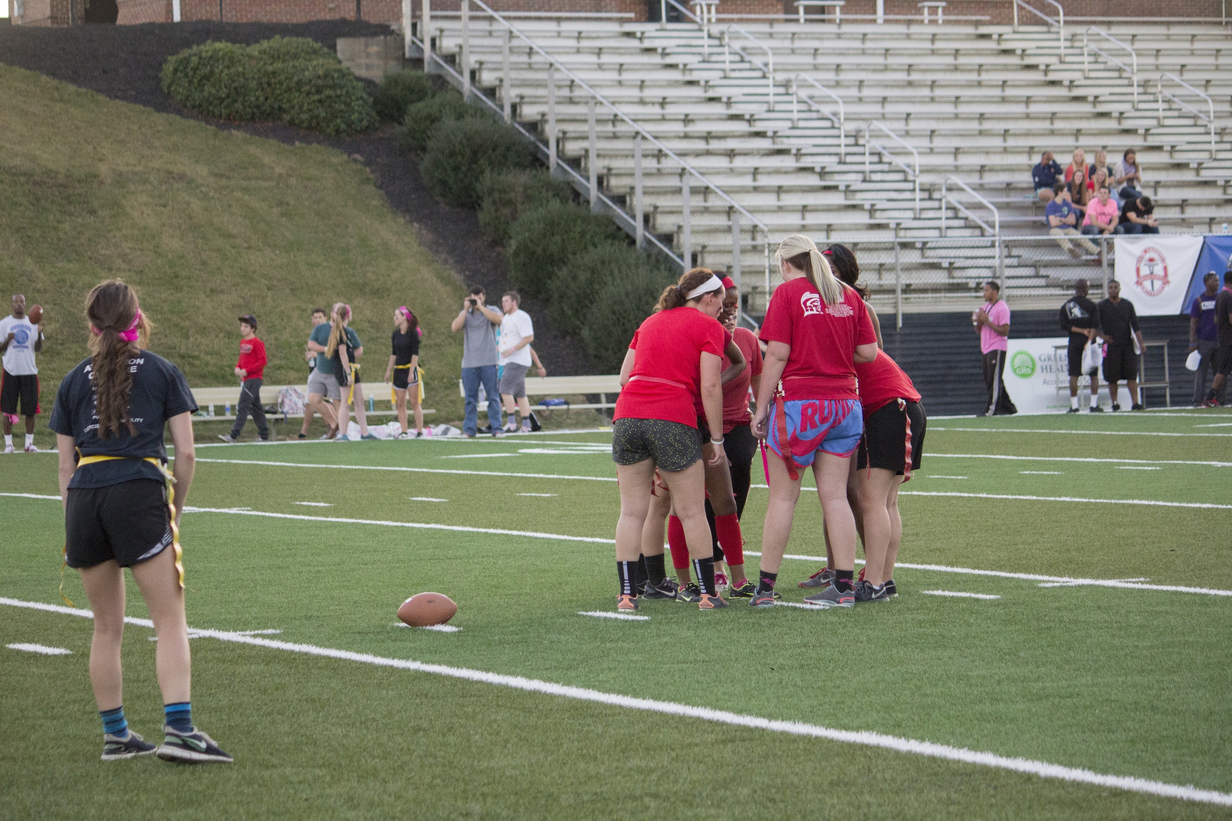  The senior team huddles up to talk about their next play.&nbsp; 