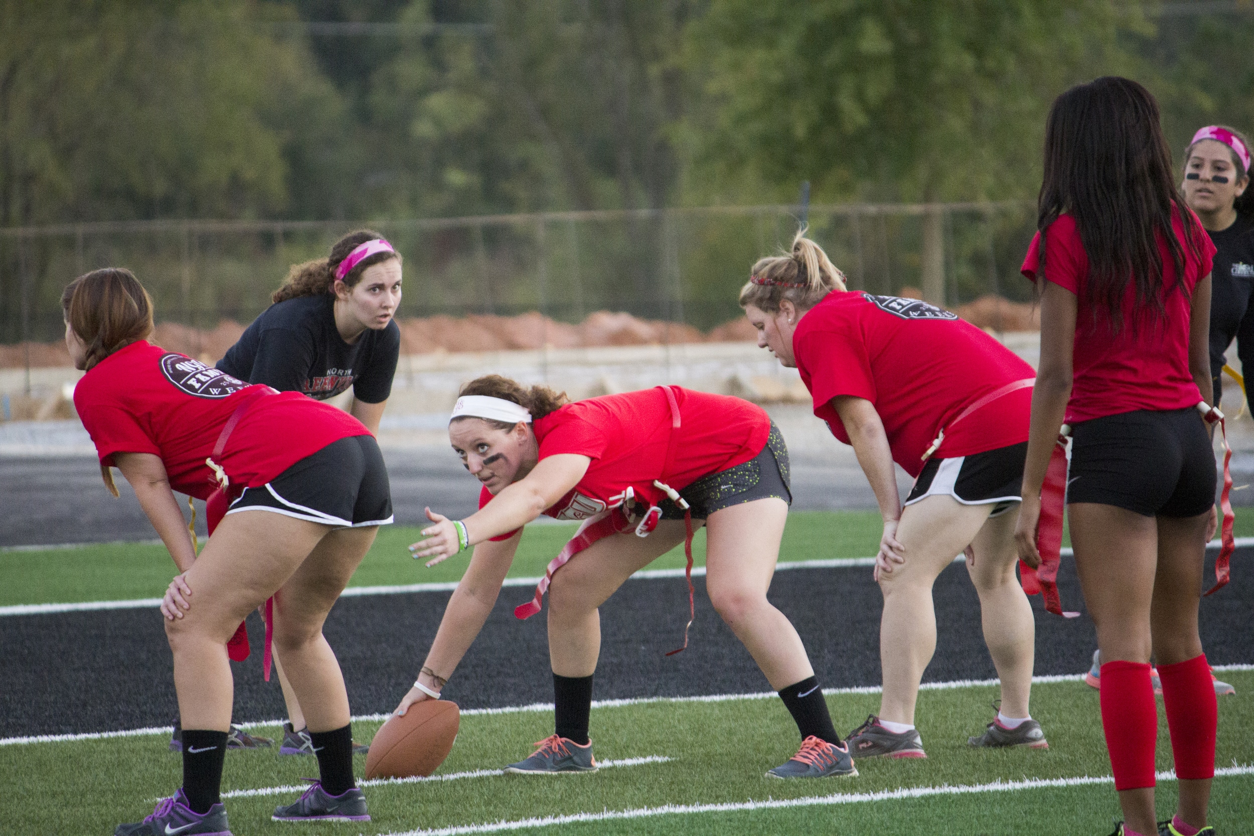  Senior Tori Freedman directs her fellow teammates before she hikes the ball.&nbsp; 