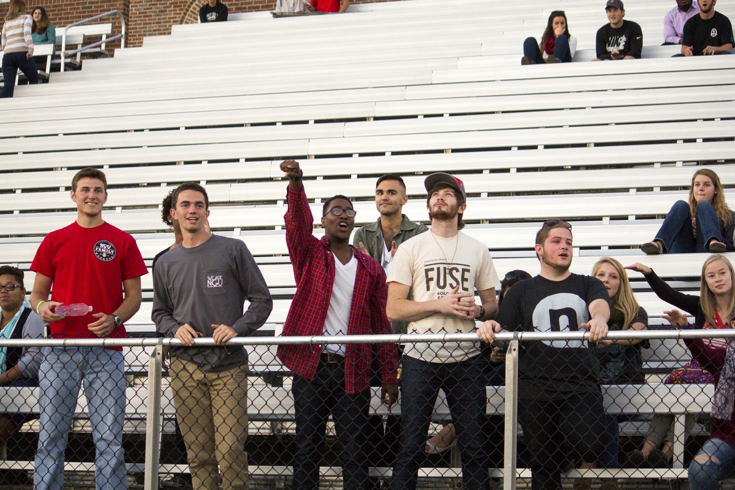  Some senior guys cheer on their fellow senior ladies during the powderpuff football game.&nbsp; 