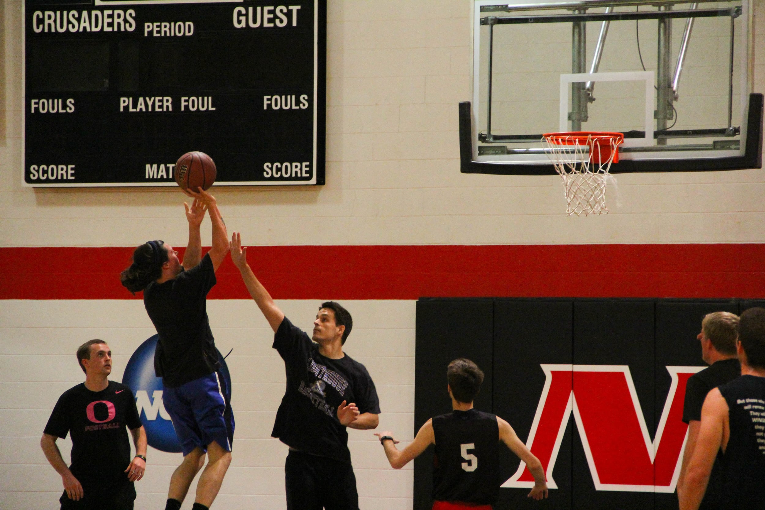  Josh Sandifer makes a jump shot at the basket.&nbsp; 