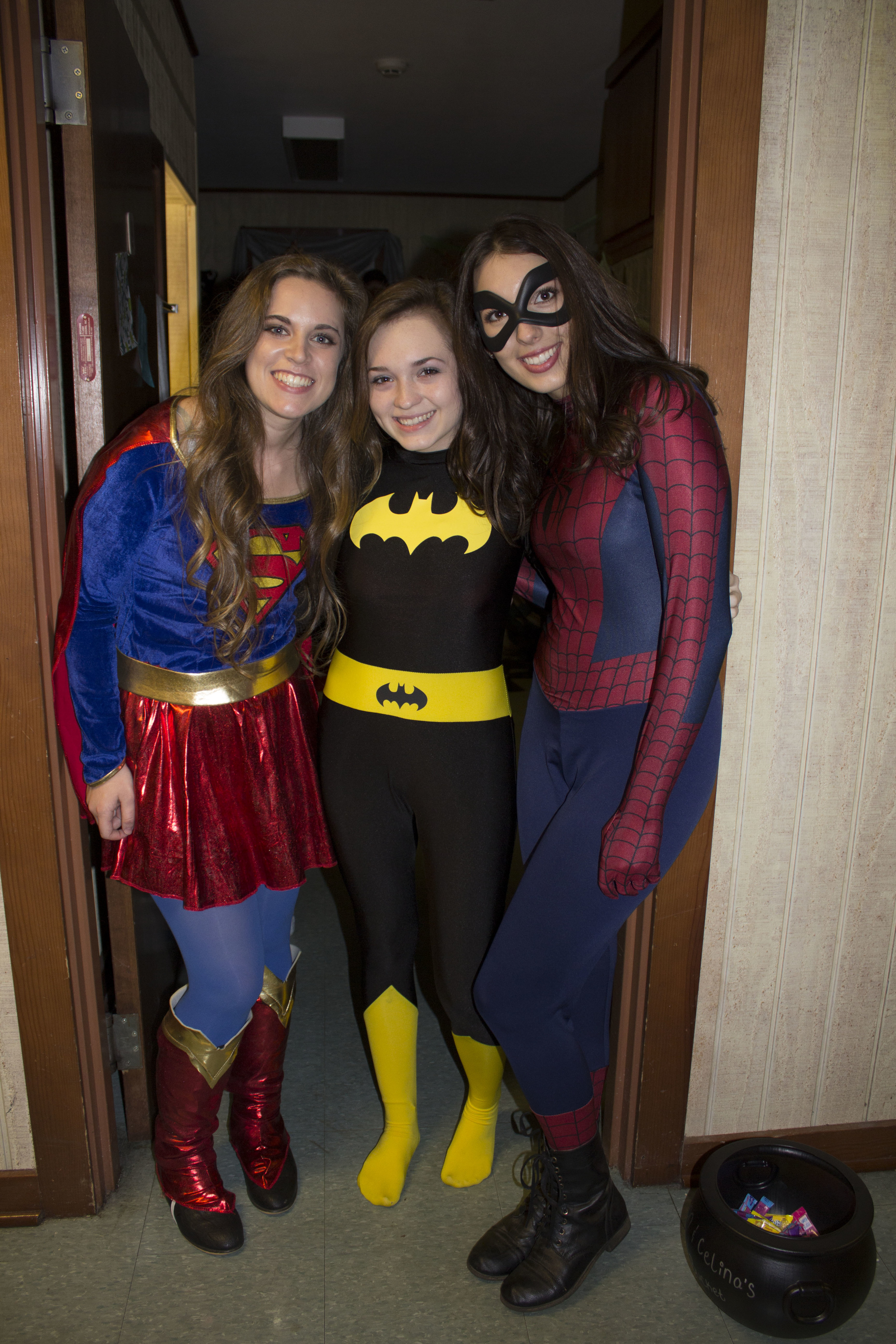  Sophomores Devon Parker and Celina Schwartz, along with Celina's sister Sophie, sport their festive Halloween superhero outfits.&nbsp; 