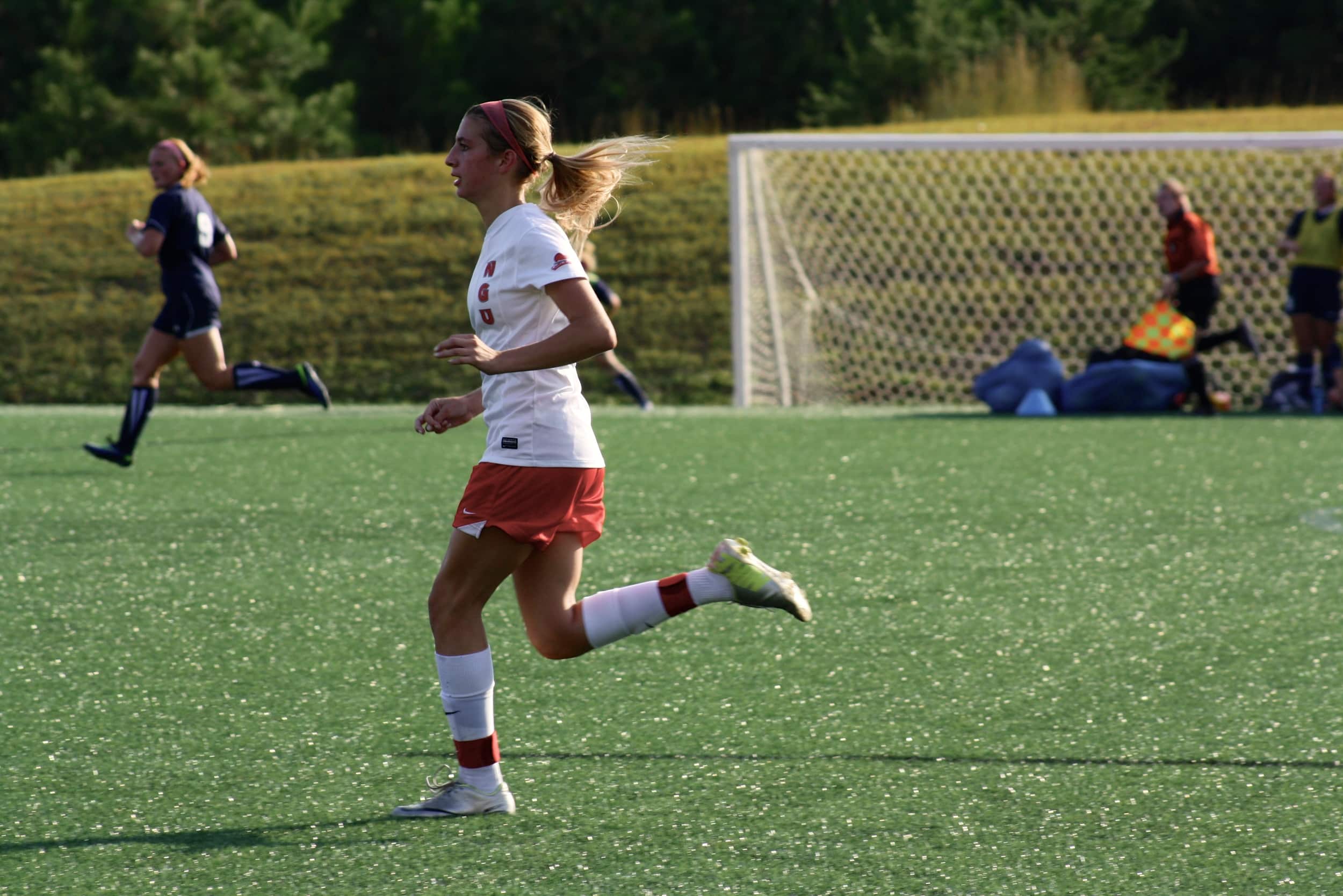  #2, Olivia Schmike, runs after the ball. 