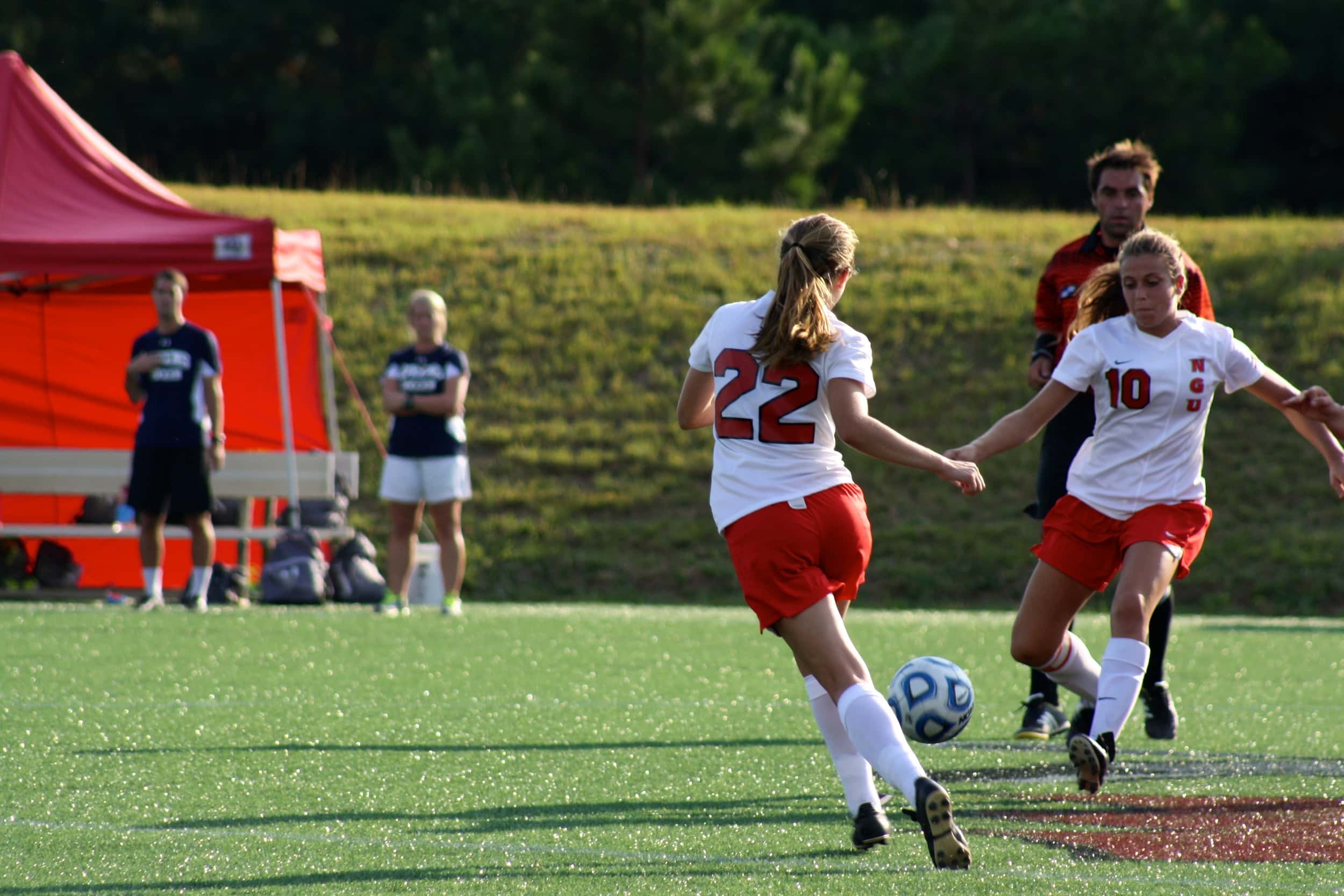  #22, Kathryn Allen, makes an attempt to get the ball. 