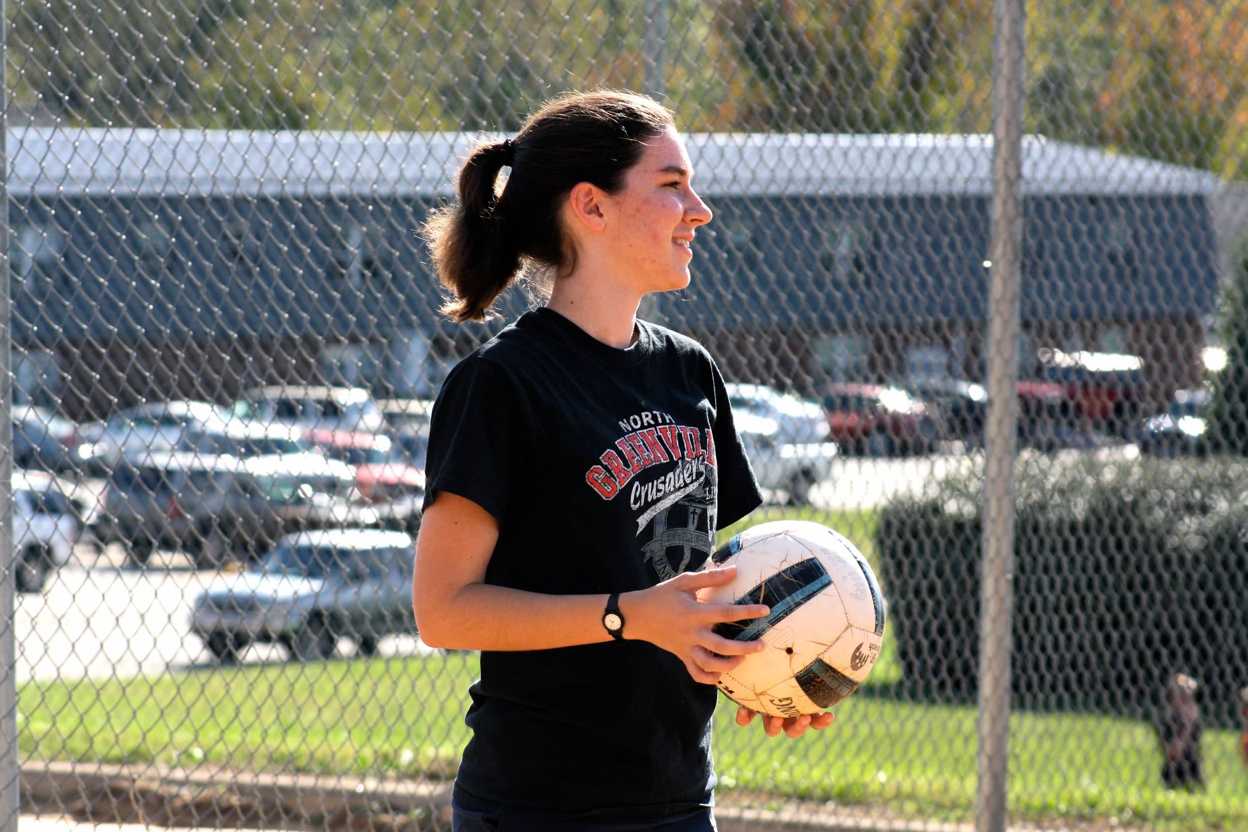  A student enjoys the volleyball tournament. 