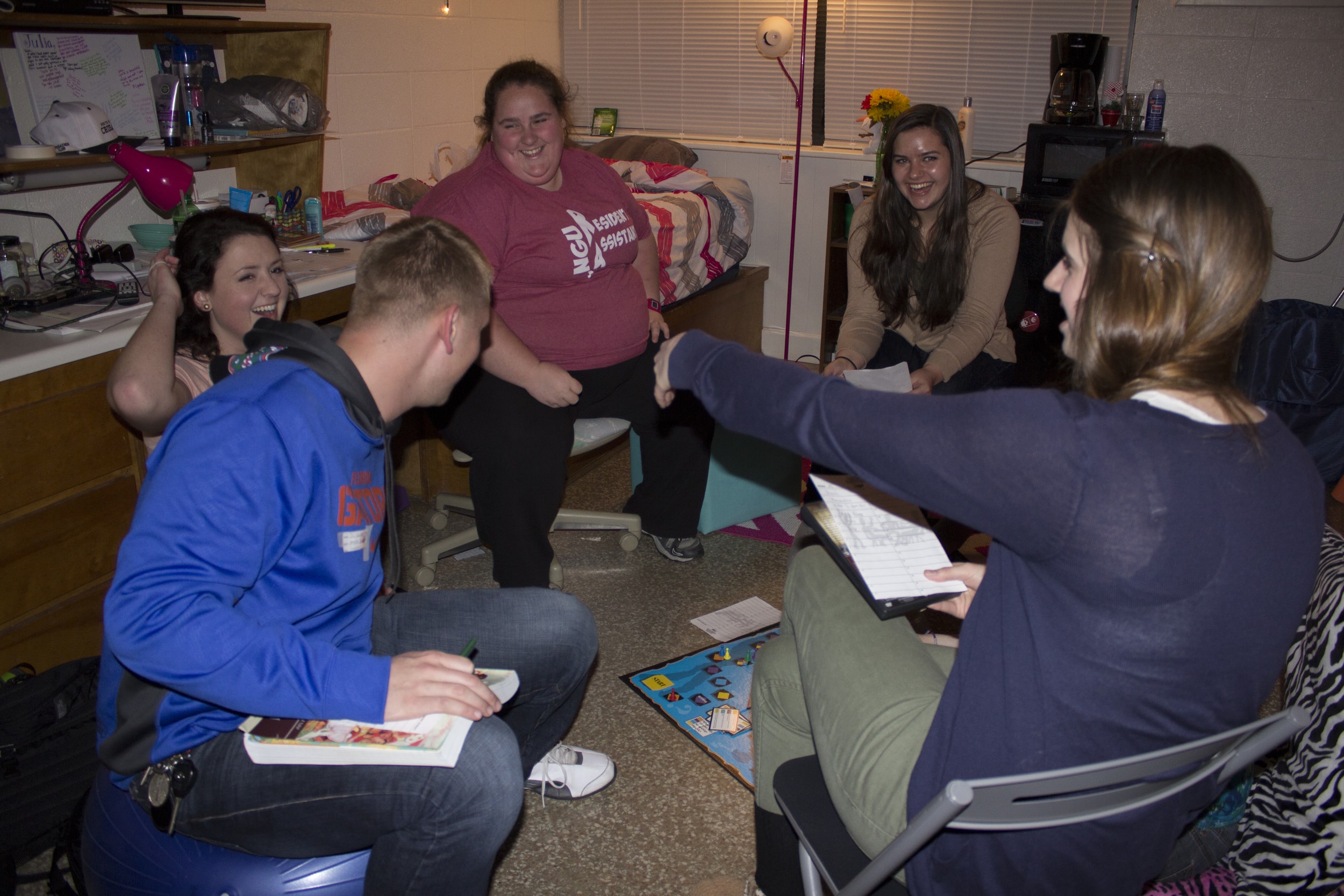  NGU students enjoy using open dorms as a chance to&nbsp;gather&nbsp;together to play some board games, laugh and just chat with each other in a different location than simply around campus at places such as the stud. Sophomore Sarah Garrett invited 