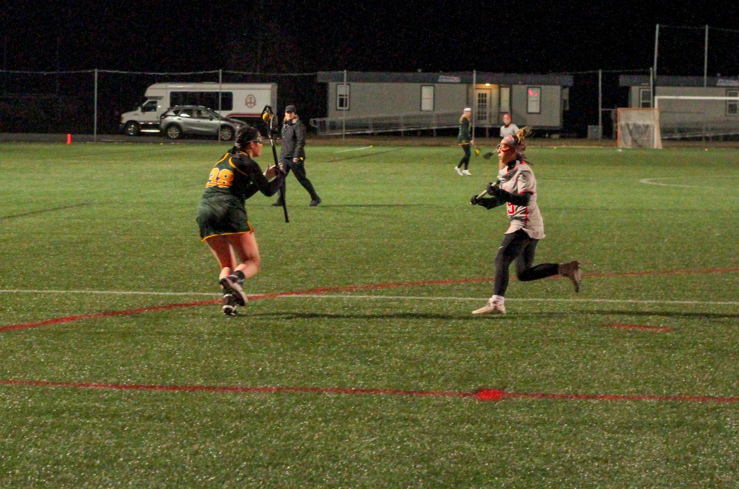 Aly Estes attacks the offensive player.