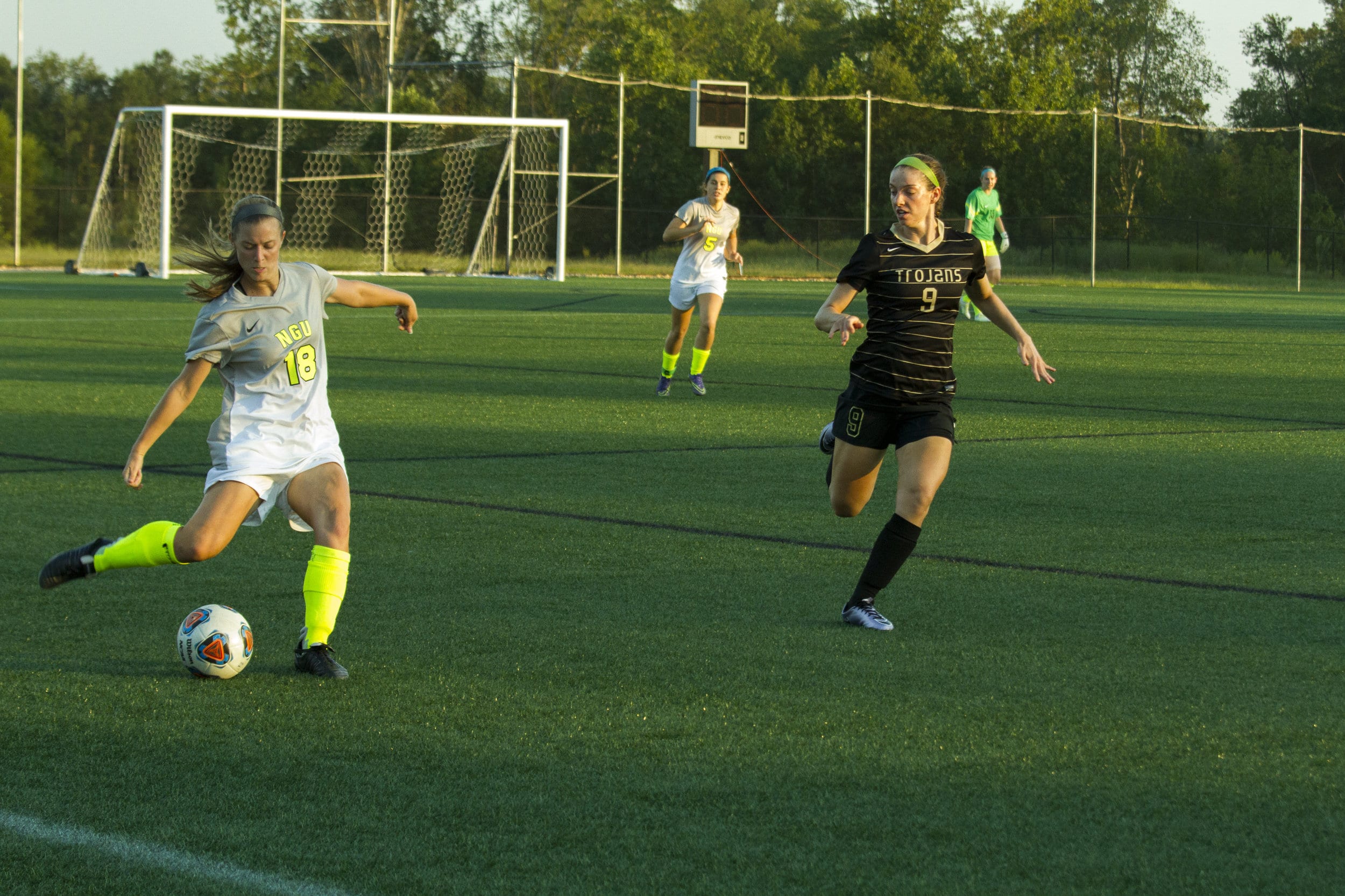  Senior Grayse Fitt looks down the line to pass to an open team member.&nbsp; 