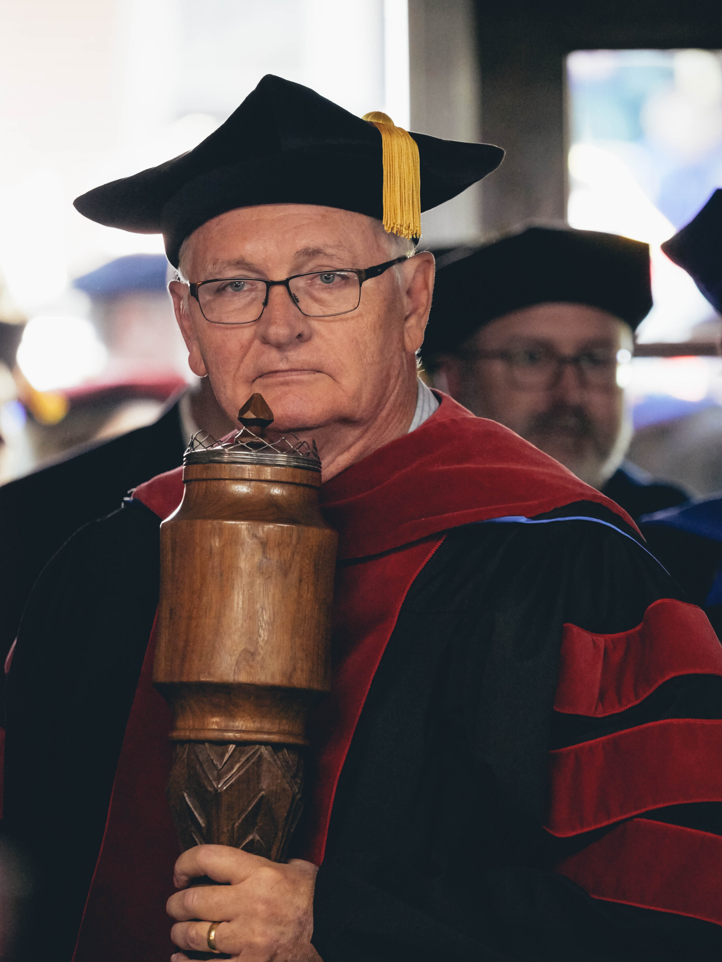 Bill Cashion Graduate missions professor leads the line of faculty into the chapel.