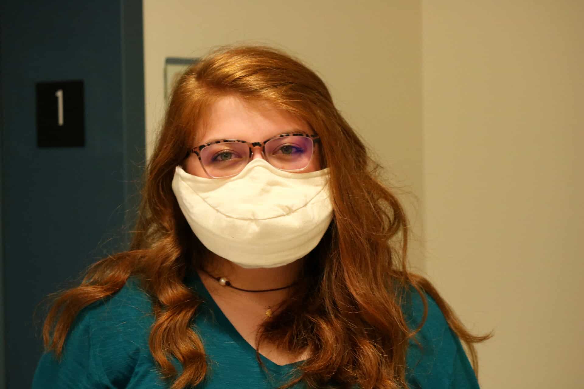Elizabeth Morris, sophomore, is a Secondary Music Education major. The mask she is wearing is designed for singers to allow for more breath and is used for the North Greenville University Choir.