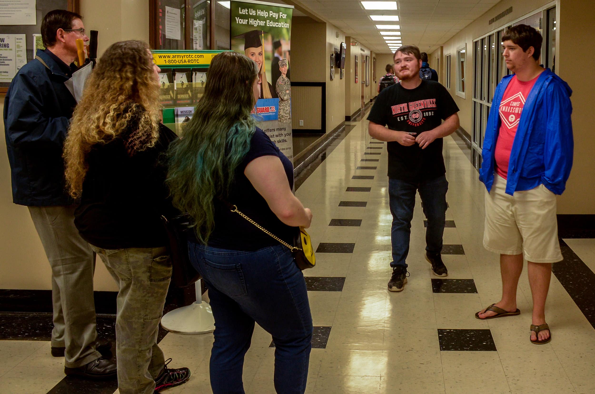 NGU students provide tours to potential Crusaders showing where students hang out, buy books and play games.