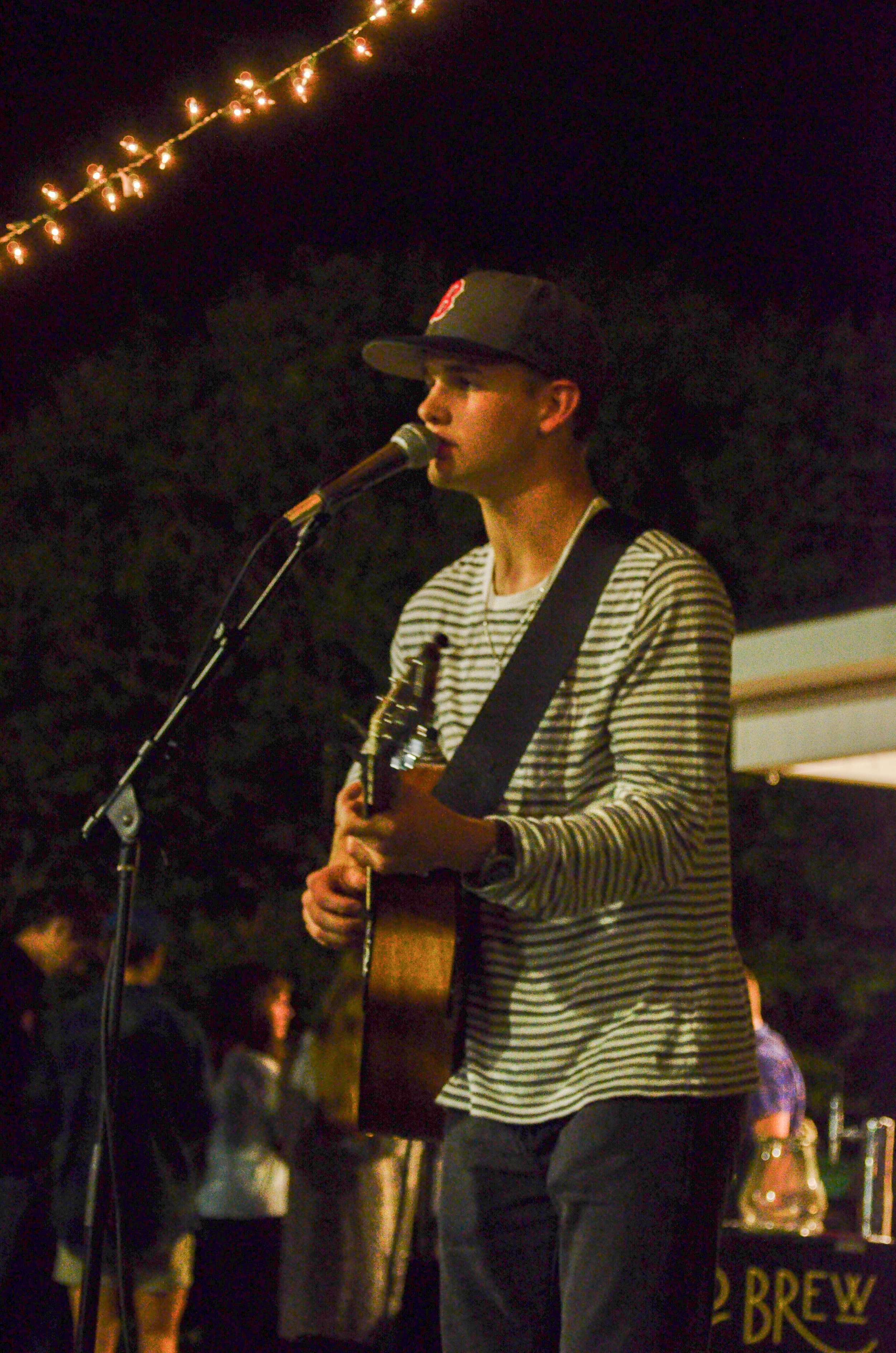 Samuel Watson plays his guitar and sings "Better Together."