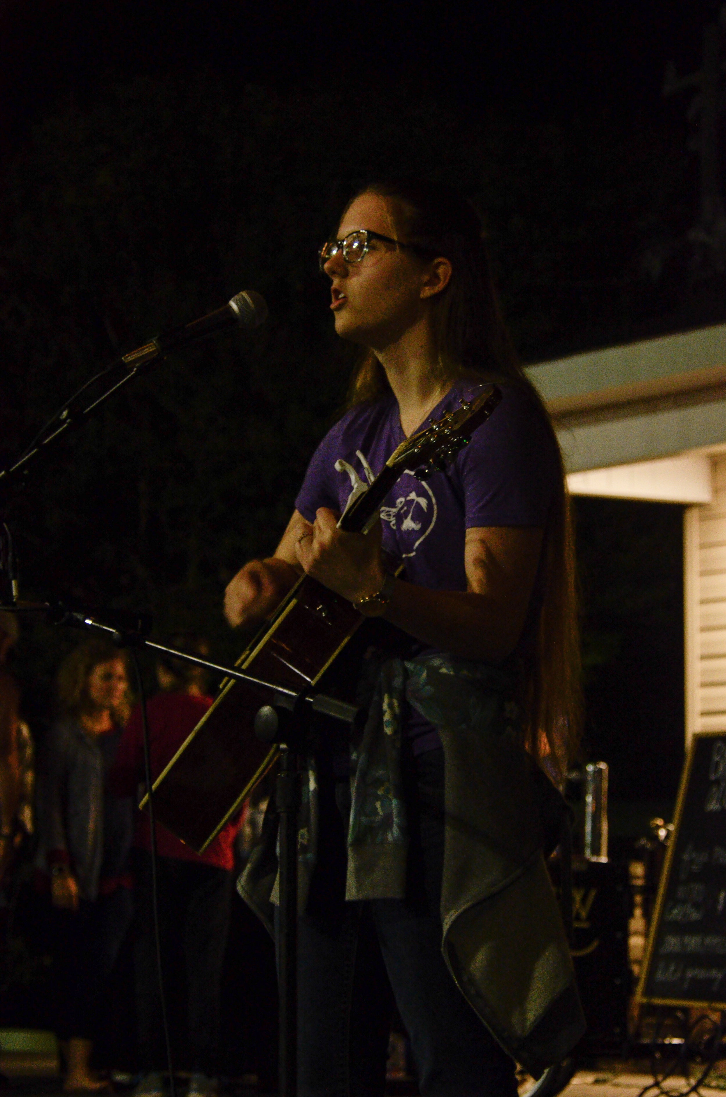 Maggie Smith plays her guitar and sings "Coat of Many Colors."