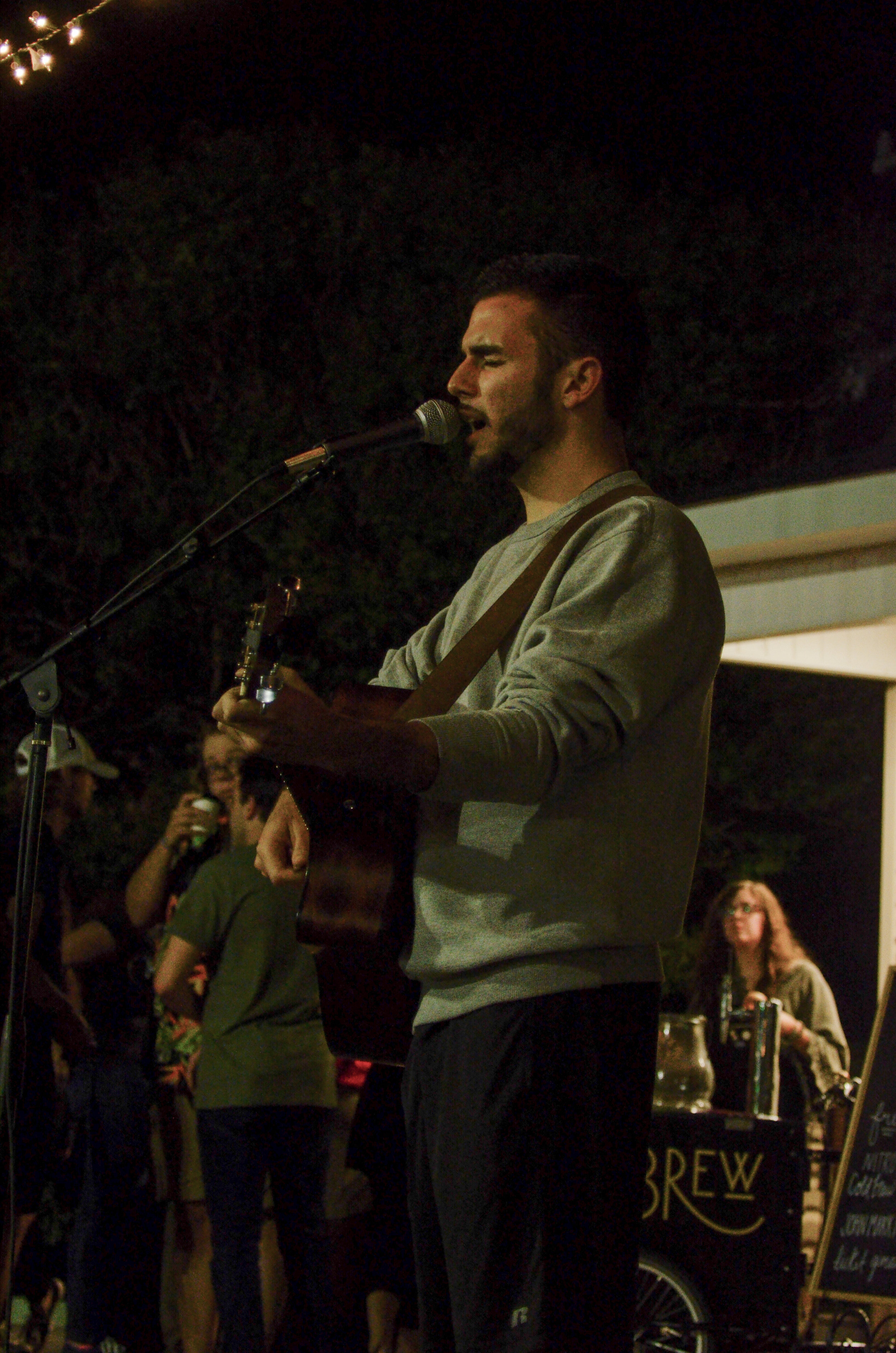 Lenny Pisano plays his guitar and sings "Sign of the Times."