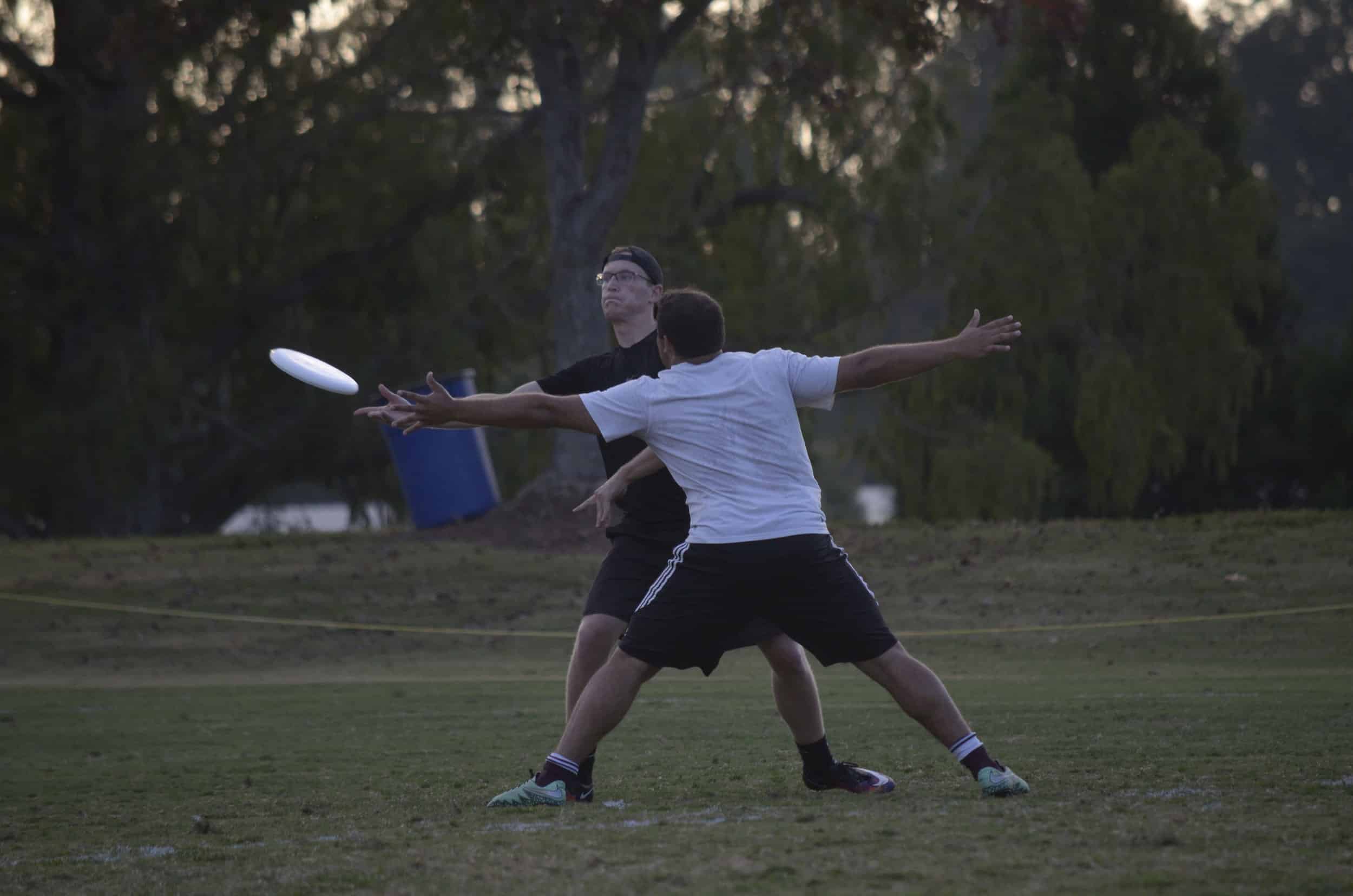 Ford Pfister passes the disc to his teammate during his first game.