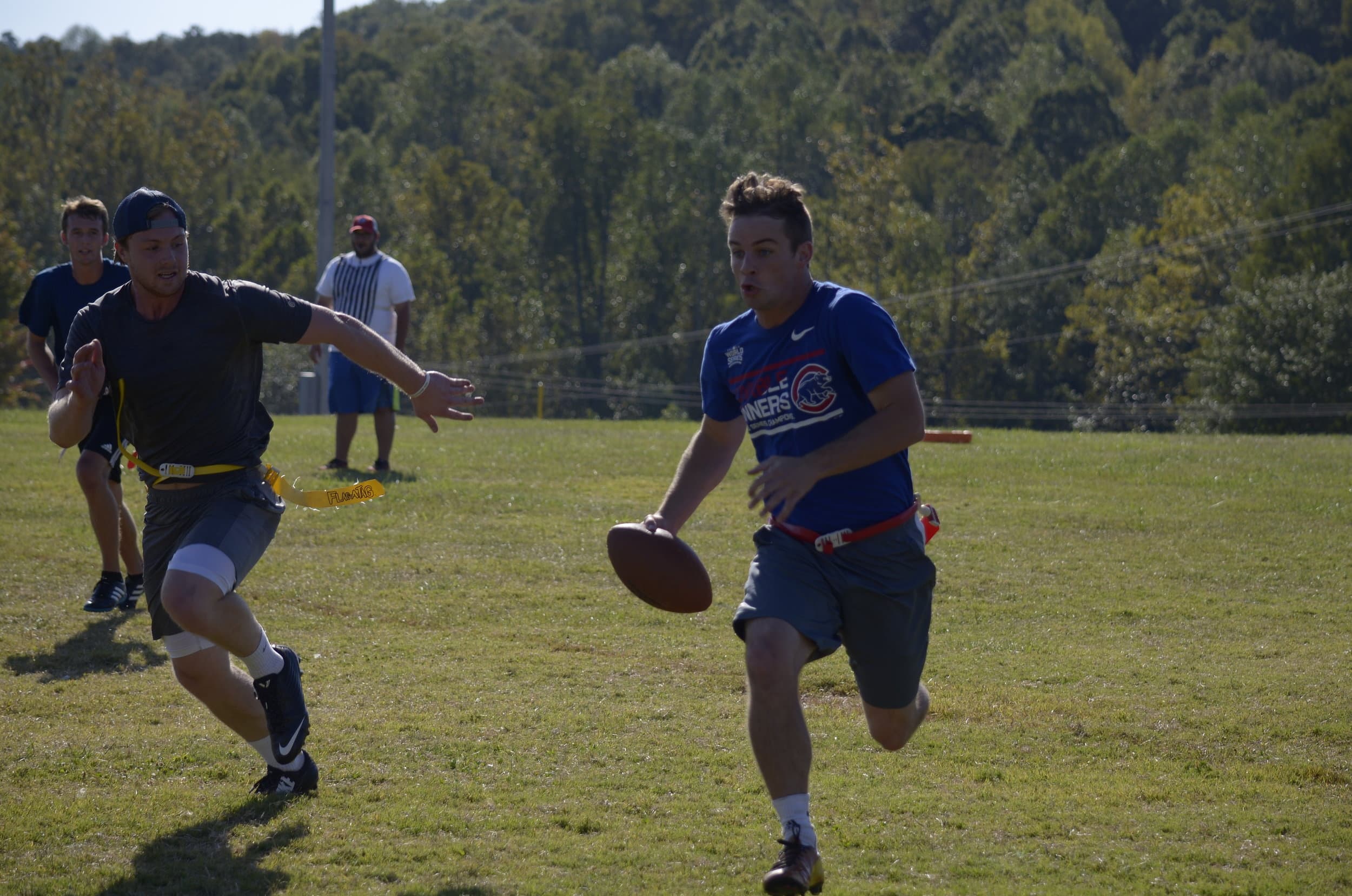 Davey Hall gets around his hard defense to get the ball further downfield.&nbsp;