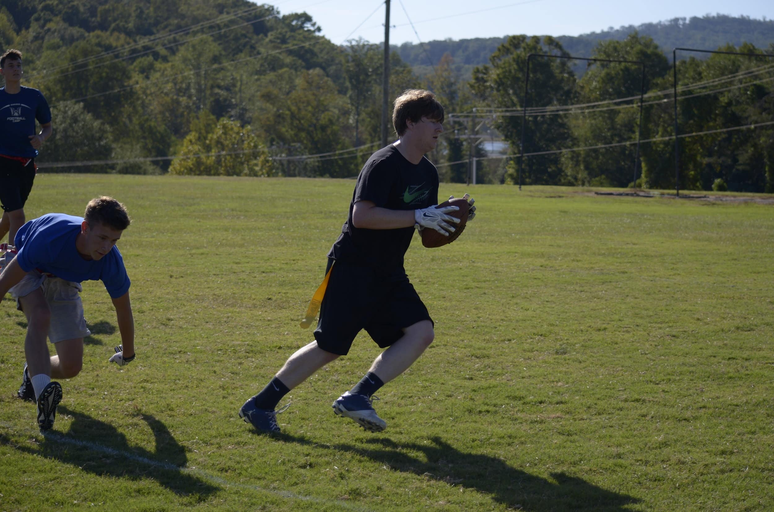 Colby Boggs catches a pass in the end zone for a touchdown for his team.