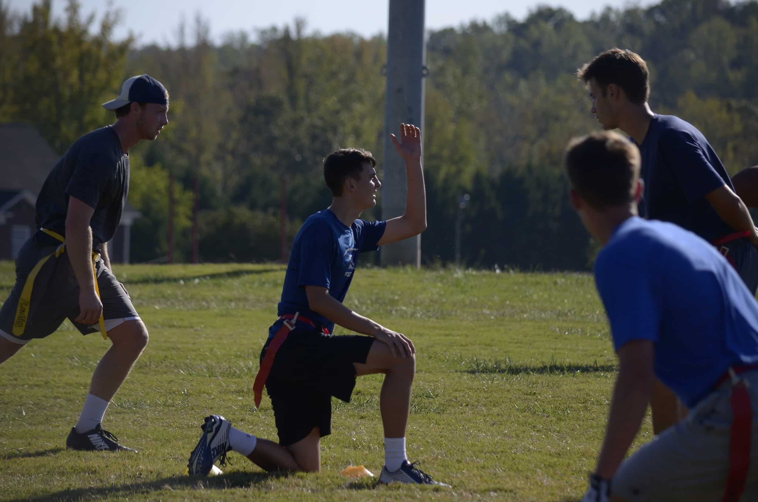 Hayden Long snaps the ball to his quarterback.