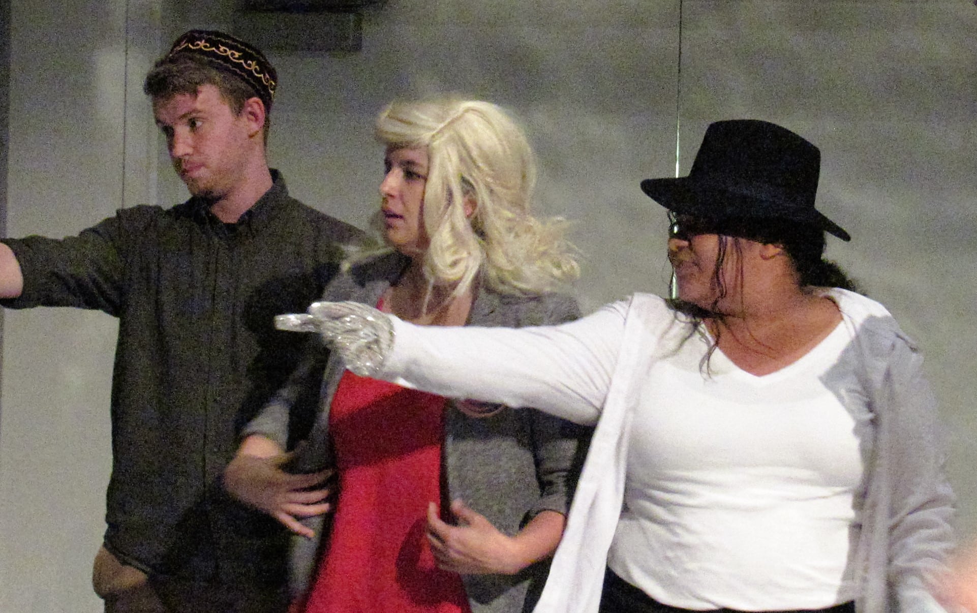 James Gilbert (left), Emily Smith (center) and DeAndra Watkins (right) improvise a party scene during October 31st's Required Chaos show. Image courtesy of Carson Myers.&nbsp;