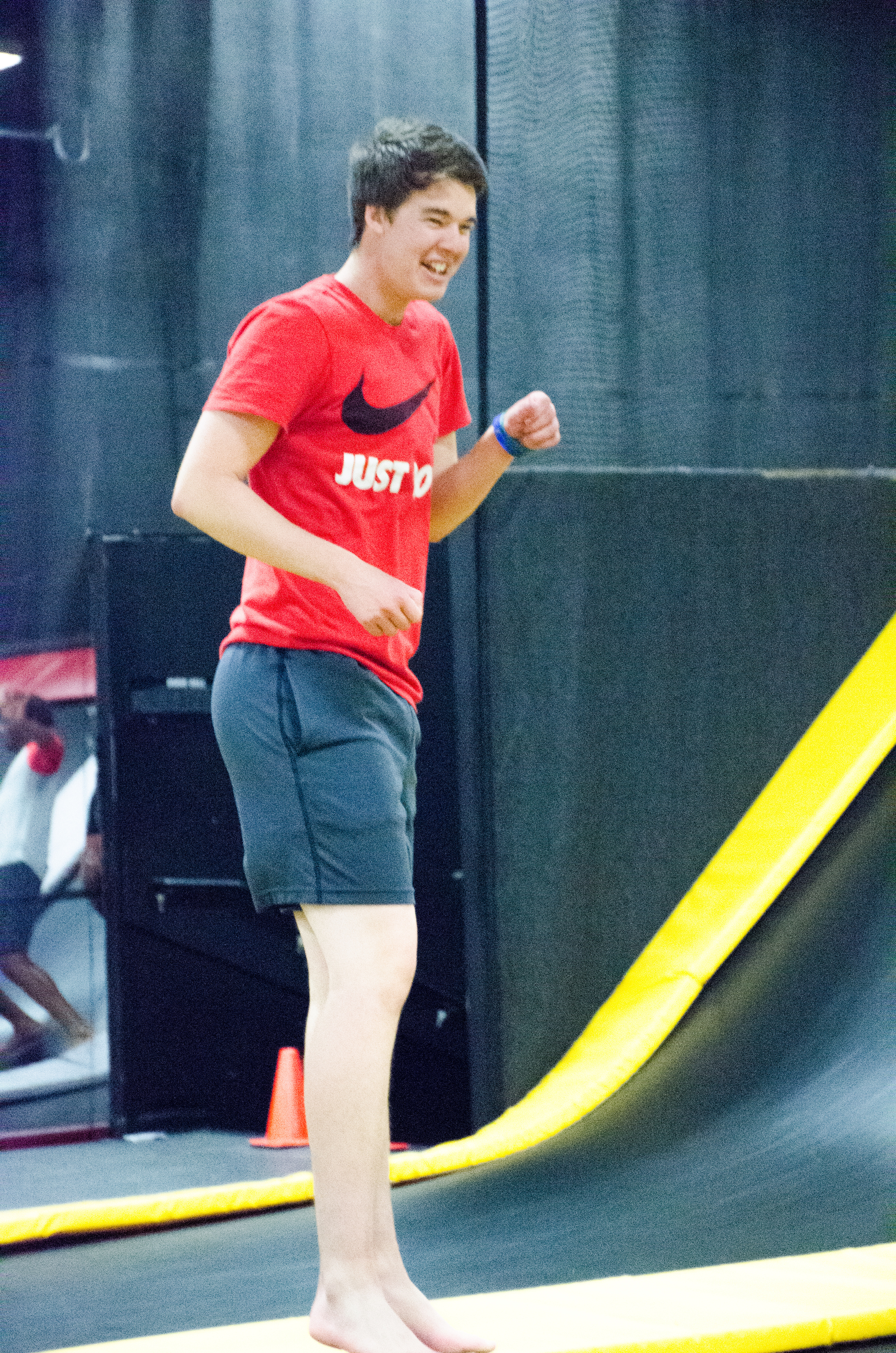 Josh Leister laughs with his friends while jumping on the trampolines.&nbsp;