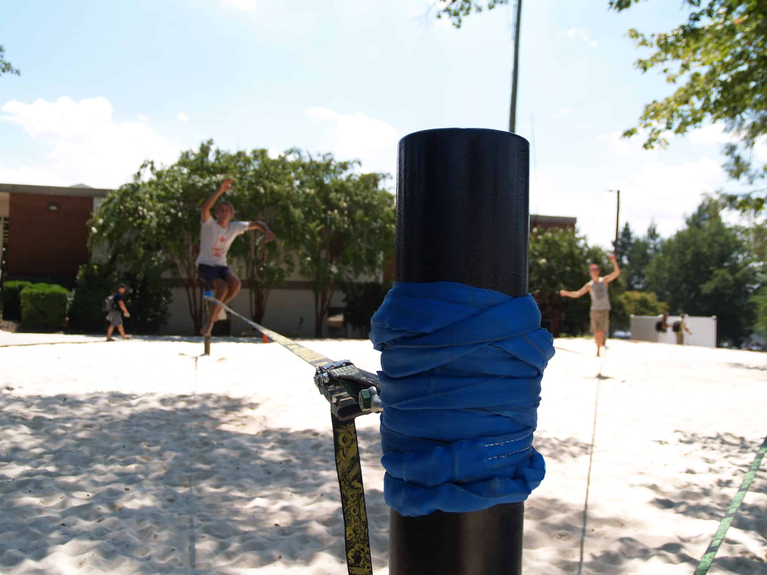   Students set up and test out the new slack lining equipment.  