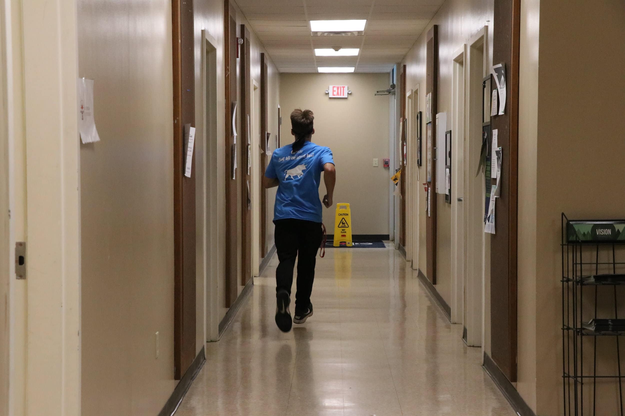 Jacob runs through the hall ways of Avery during a challenge called El Camino de Santiago. The challenge here was to walk or run a kilometer in under four minutes. Students had to start in the lobby of AV Wood, go upstairs, go down the stairs thro