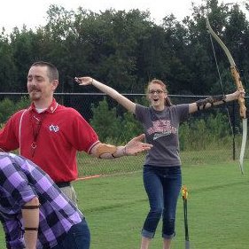 Photo Credit: Lauren GravelyJonathan Rentz, instructor, admits Tiffany is better at archery than he expected.&nbsp;