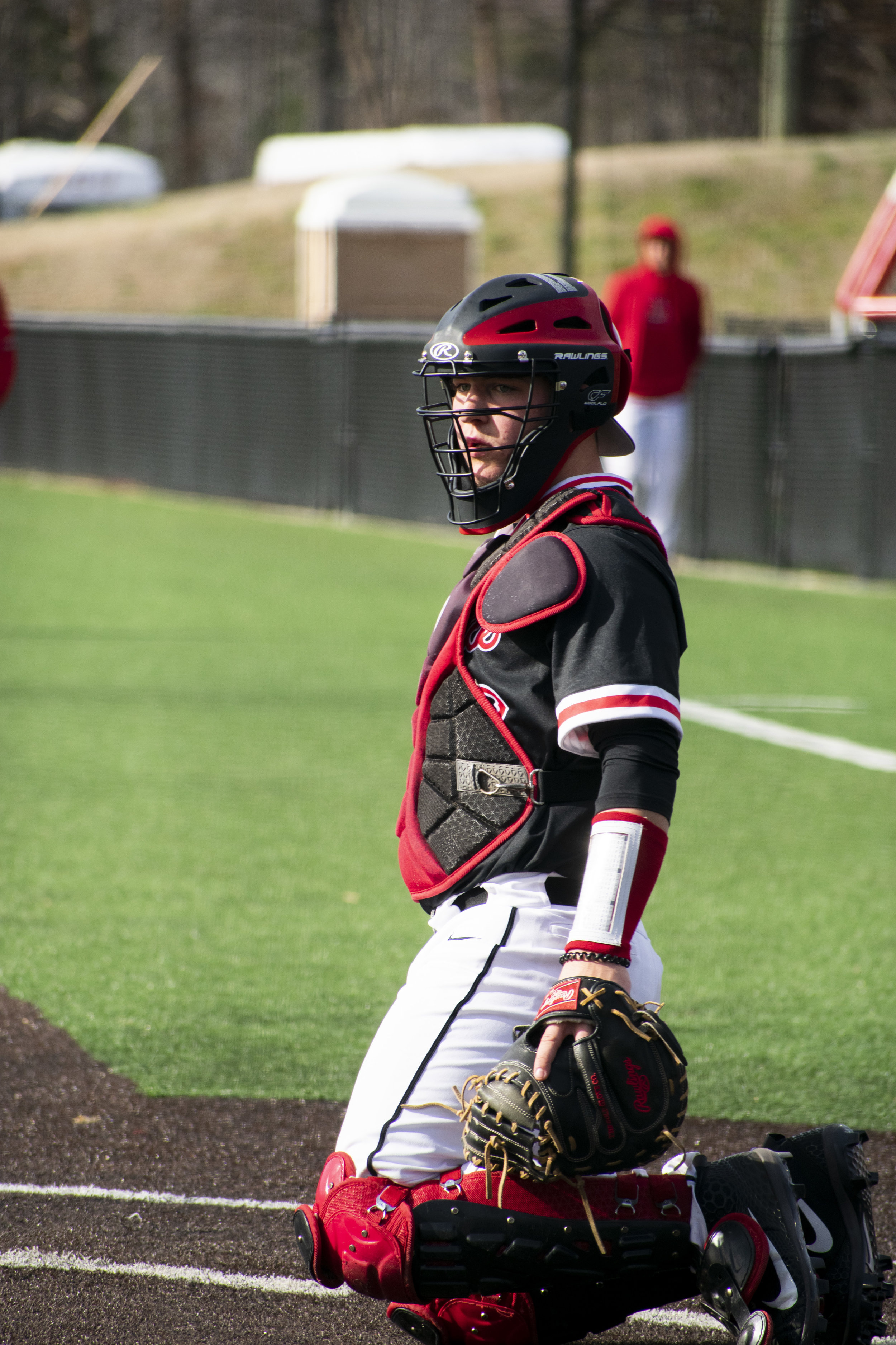 Freshman John Michael Faile (13) waits to catch the ball from the pitcher.