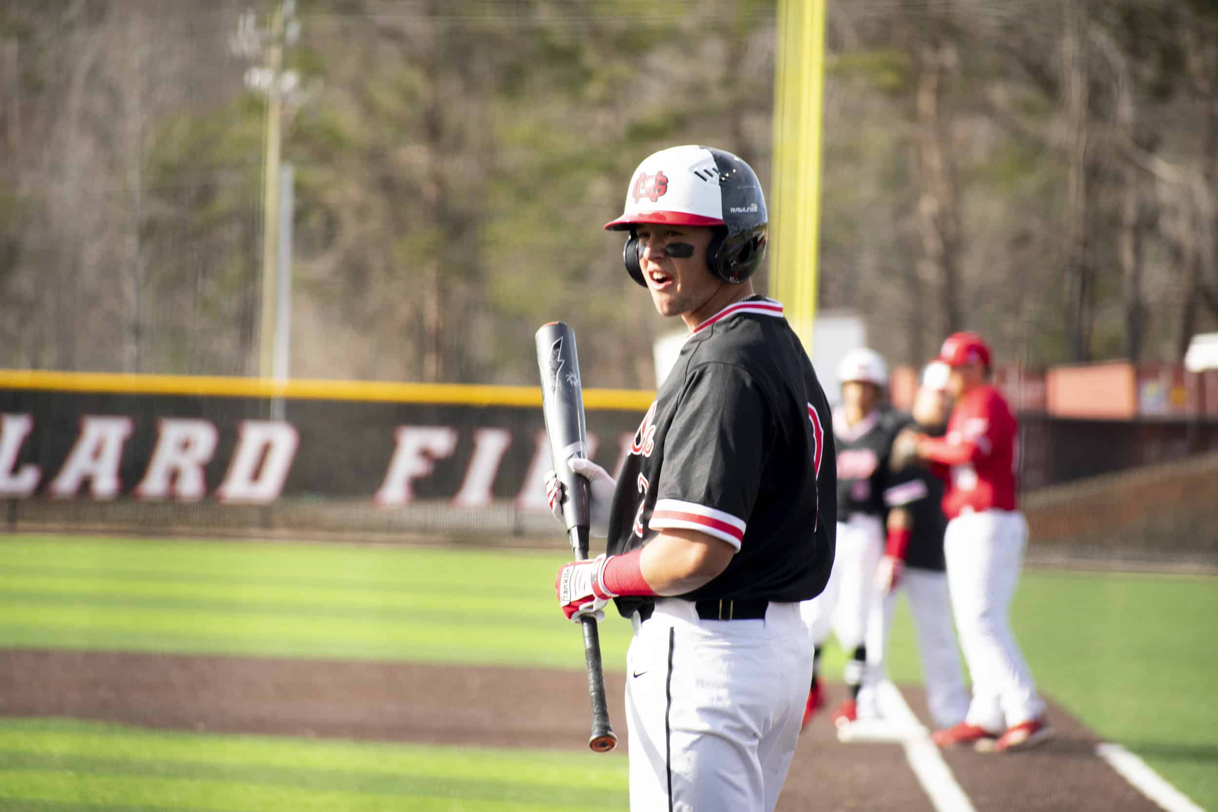 Senior Utah Jones (2) waits to swing the bat during a small pause in the game because of the ball needs to get back to the pitcher.