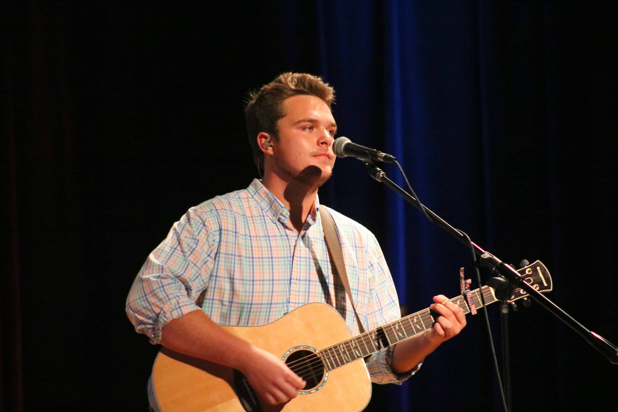 Matthew Shirk, a sophomore on vocals, leads the congregation in worship Thursday night at Baptist Collegiate Ministry.