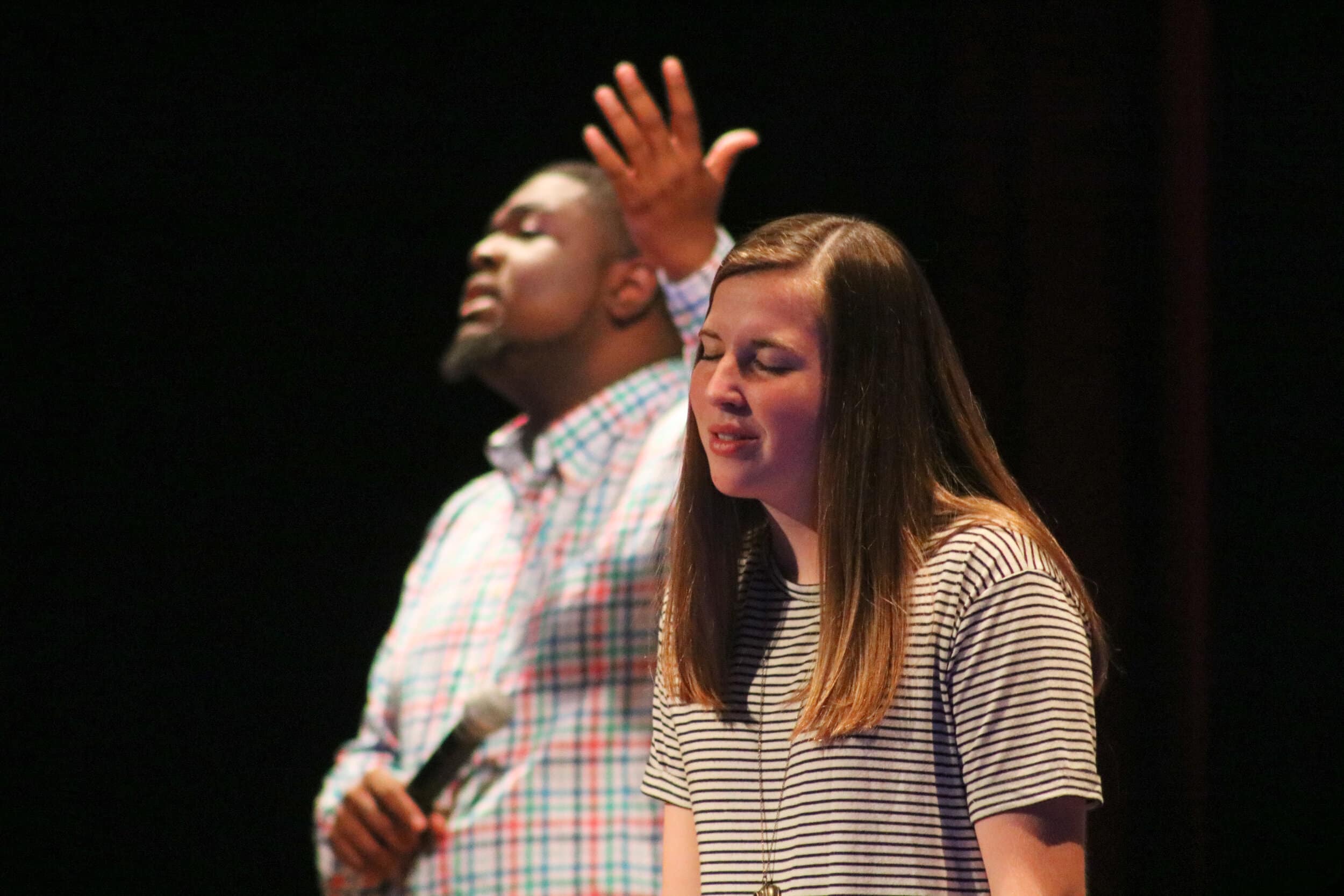 Sophomore Kaitlin Harrison (vocals) and sophomore Paul Scotland (vocals) help lead worship with the other BCM band members.