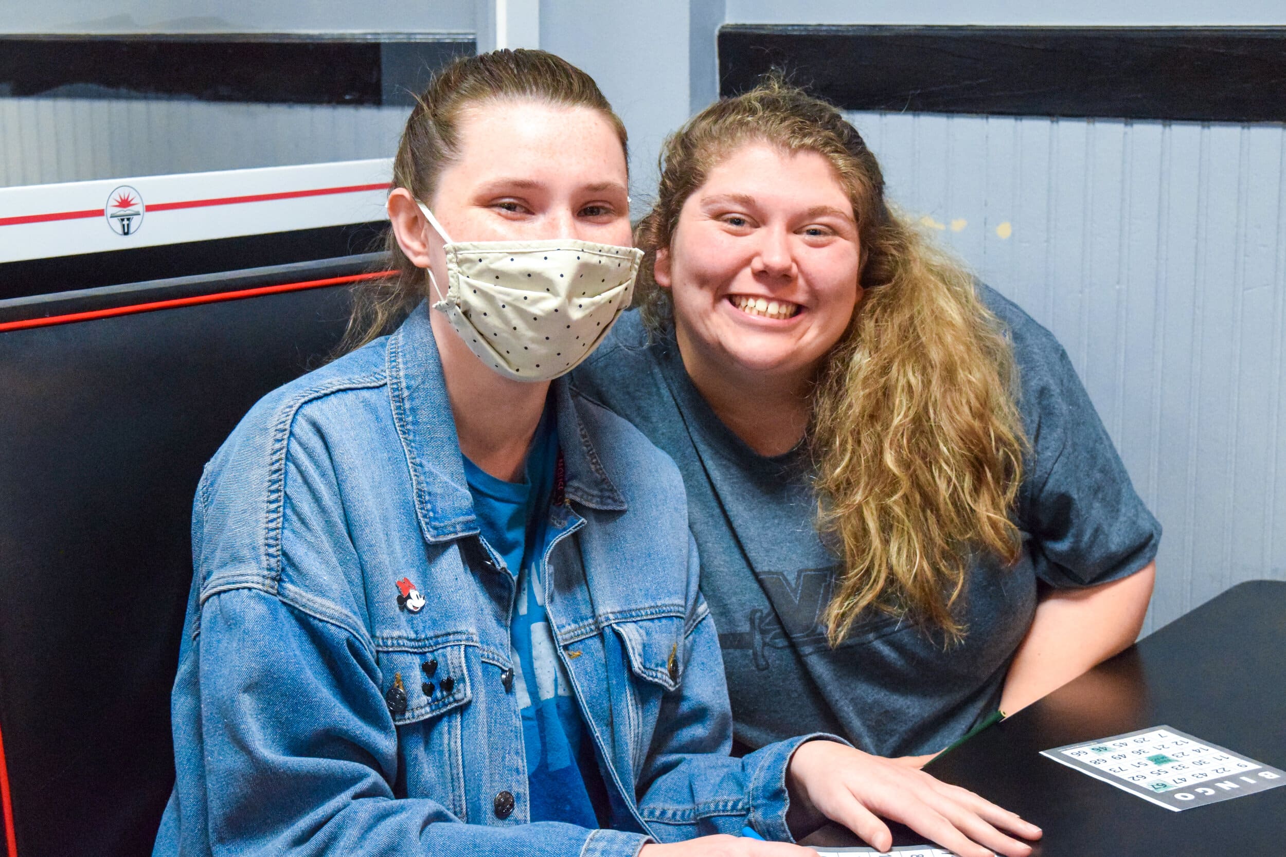 Hannah Rankin, junior Christian studies major and Daisy Scruggs, sophomore elementary education major smile for the camera at bingo night.&nbsp;