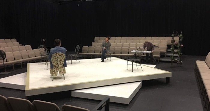 Actors Jonathan Sieberhagen and Tanner Dean practice for The Importance of Being Earnest, while Dale Savidge directs off-stage.Source: DeAndra Watkins
