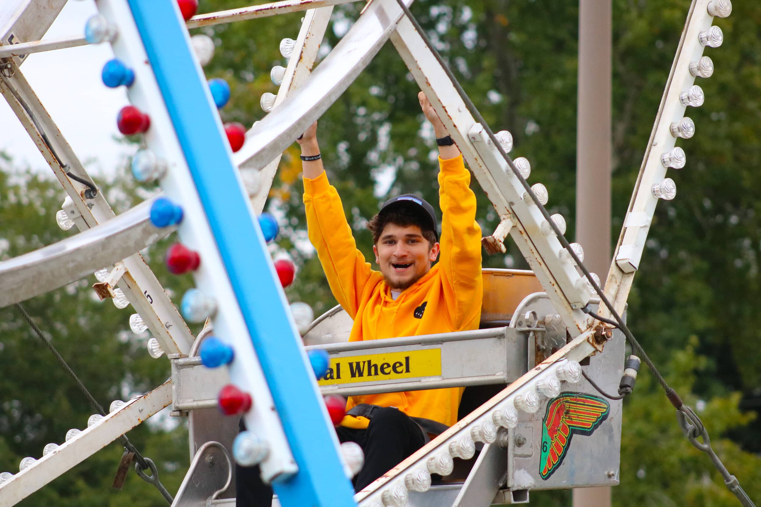 Sophomore Bryce Faulkenberry shouts for joy as he rides the Ferris wheel.