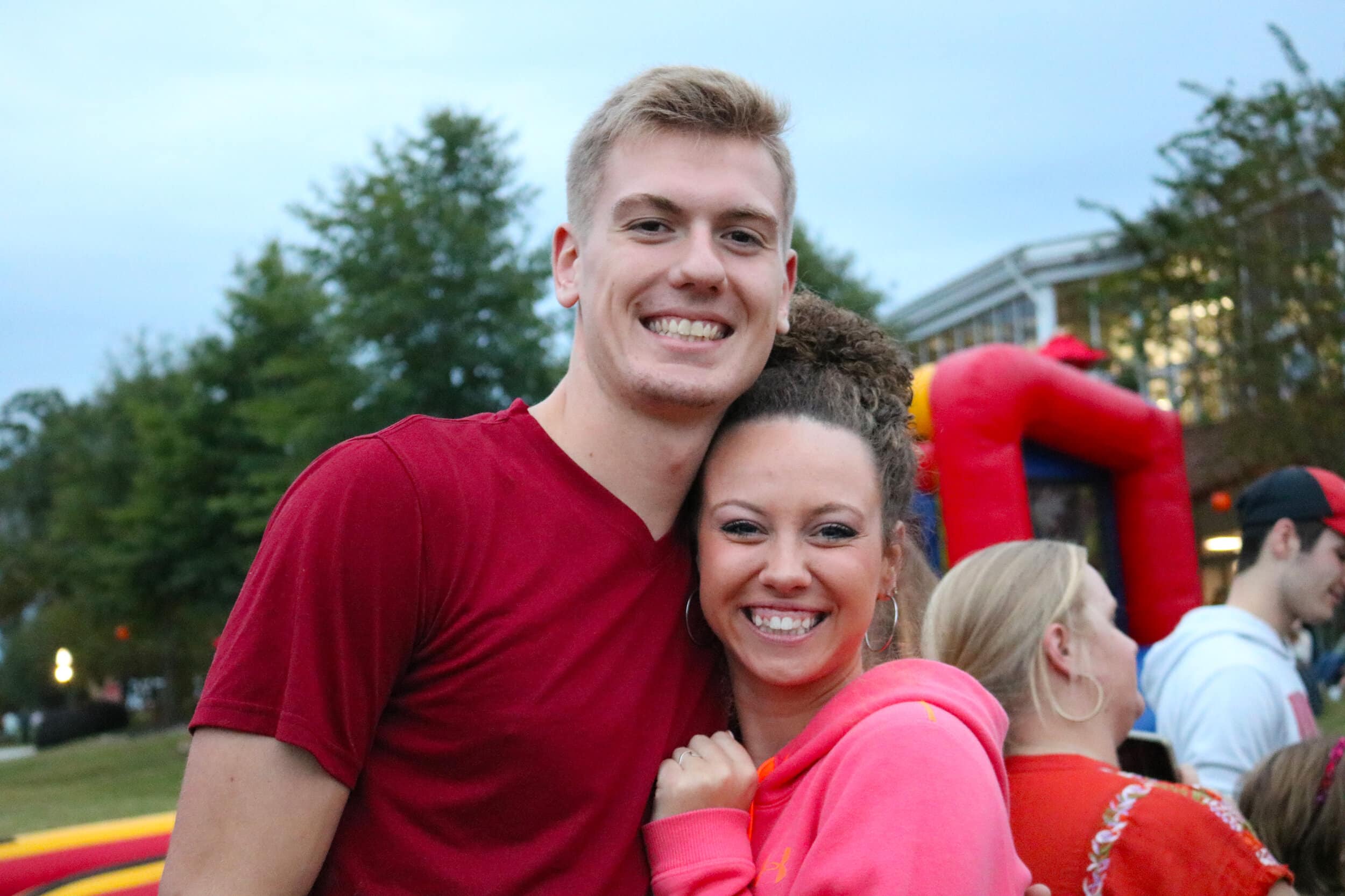 Freshman Mason Zick and sophomore Hannah Turner wait in line for some cotton candy.