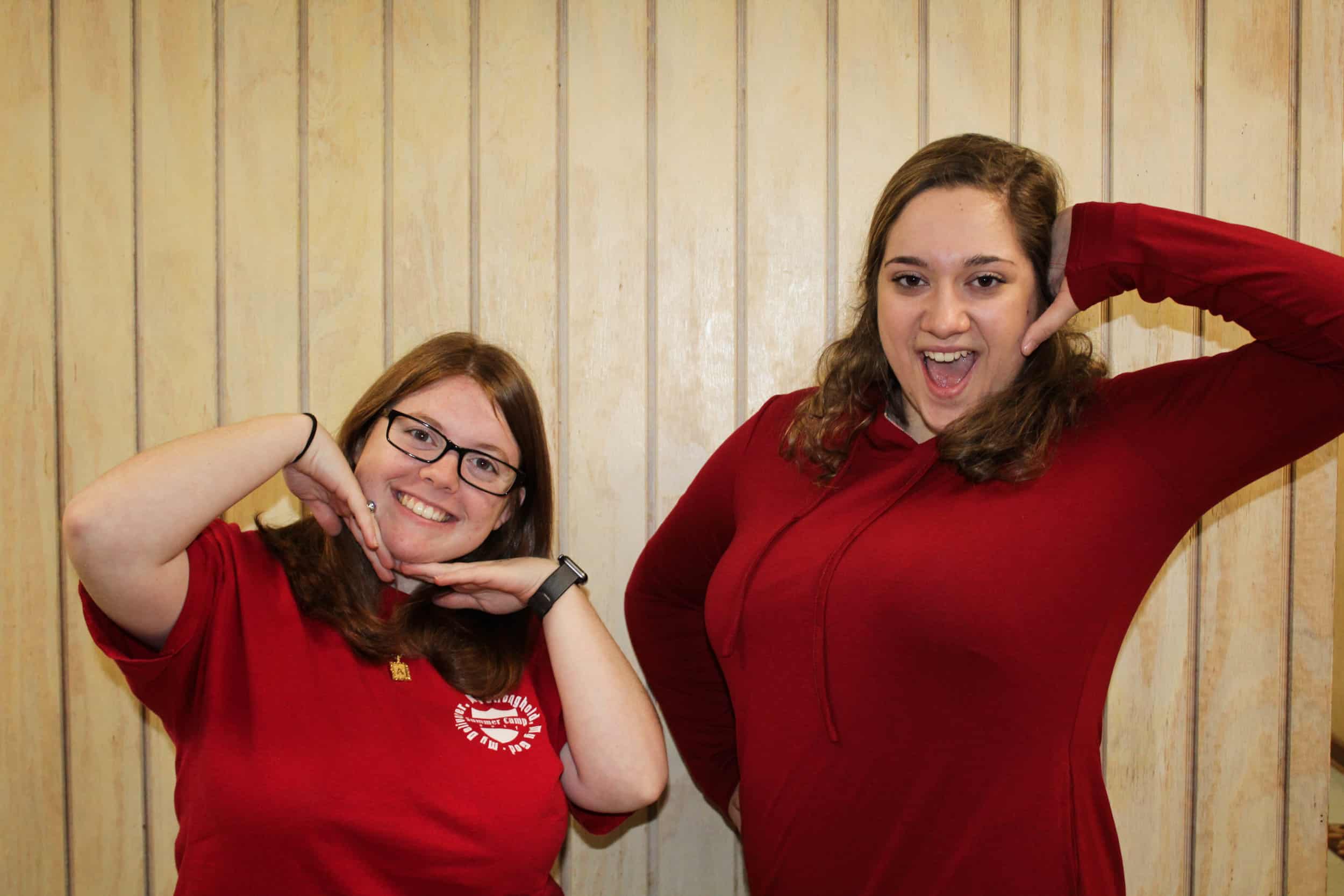 Fellow freshmen education majors Kayla Anthony and Nicole Pollard display their support while they strike a goofy pose.