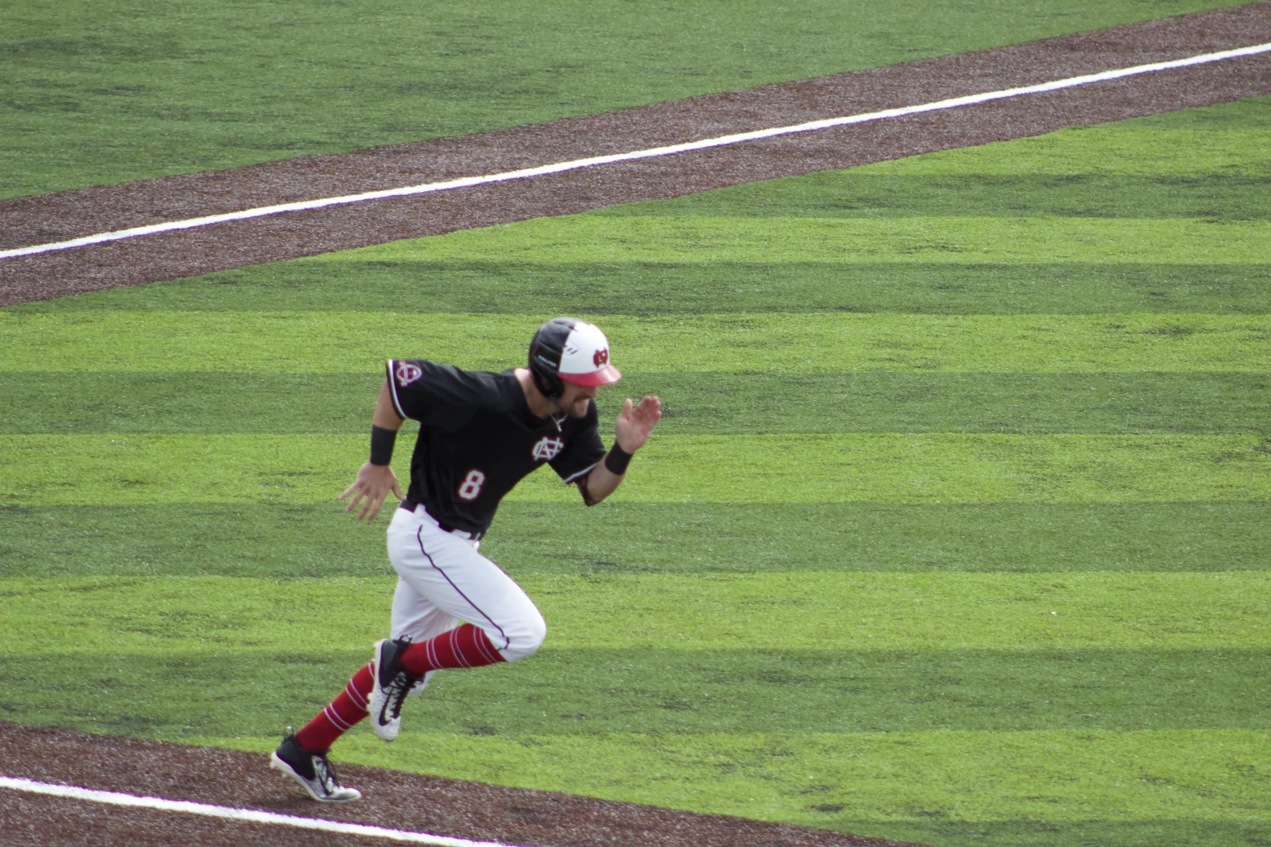 Josh Black running for first base.&nbsp;