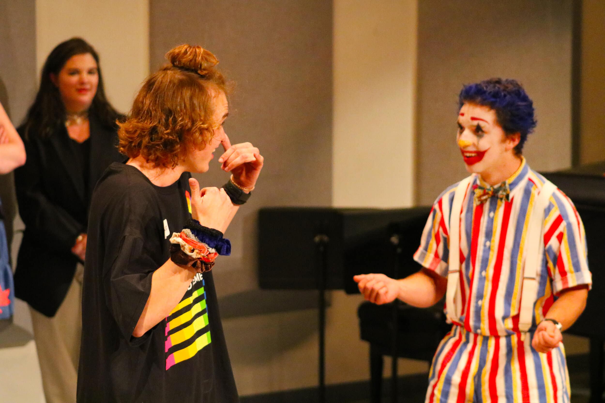 Junior Jonathon Reece and King perform in their first show as part of the Required Chaos team, Reece as a VSCO girl and King as a clown.