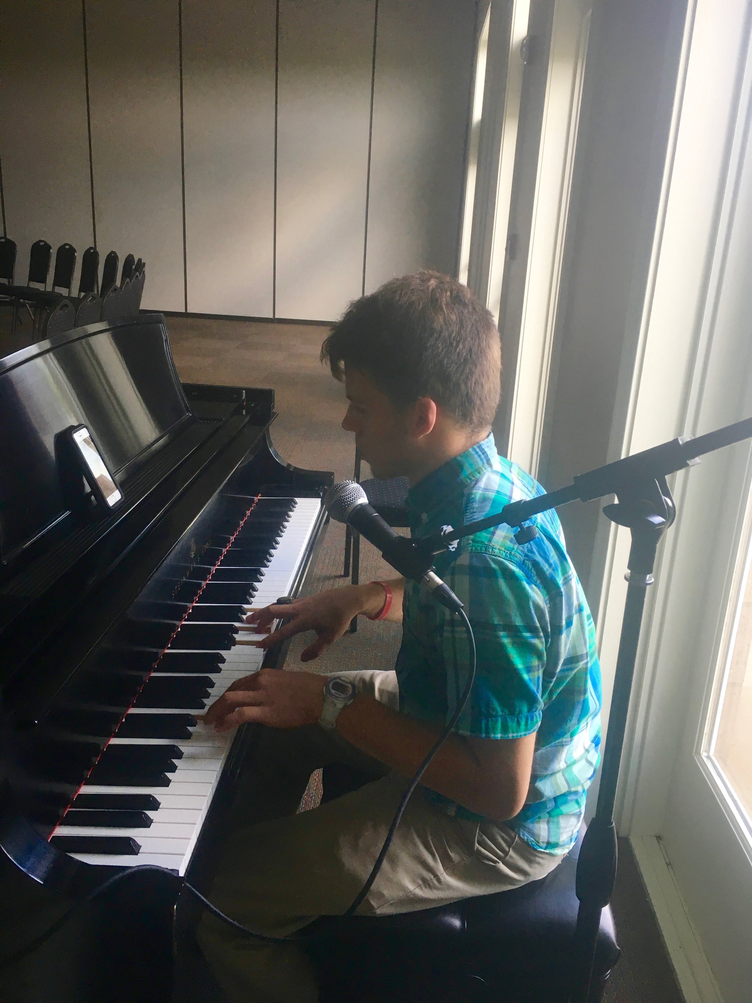 George Case plays piano and has been teaching himself how to play by ear since he was about 15 years old. Photo Courtesy of Ashley Merck.