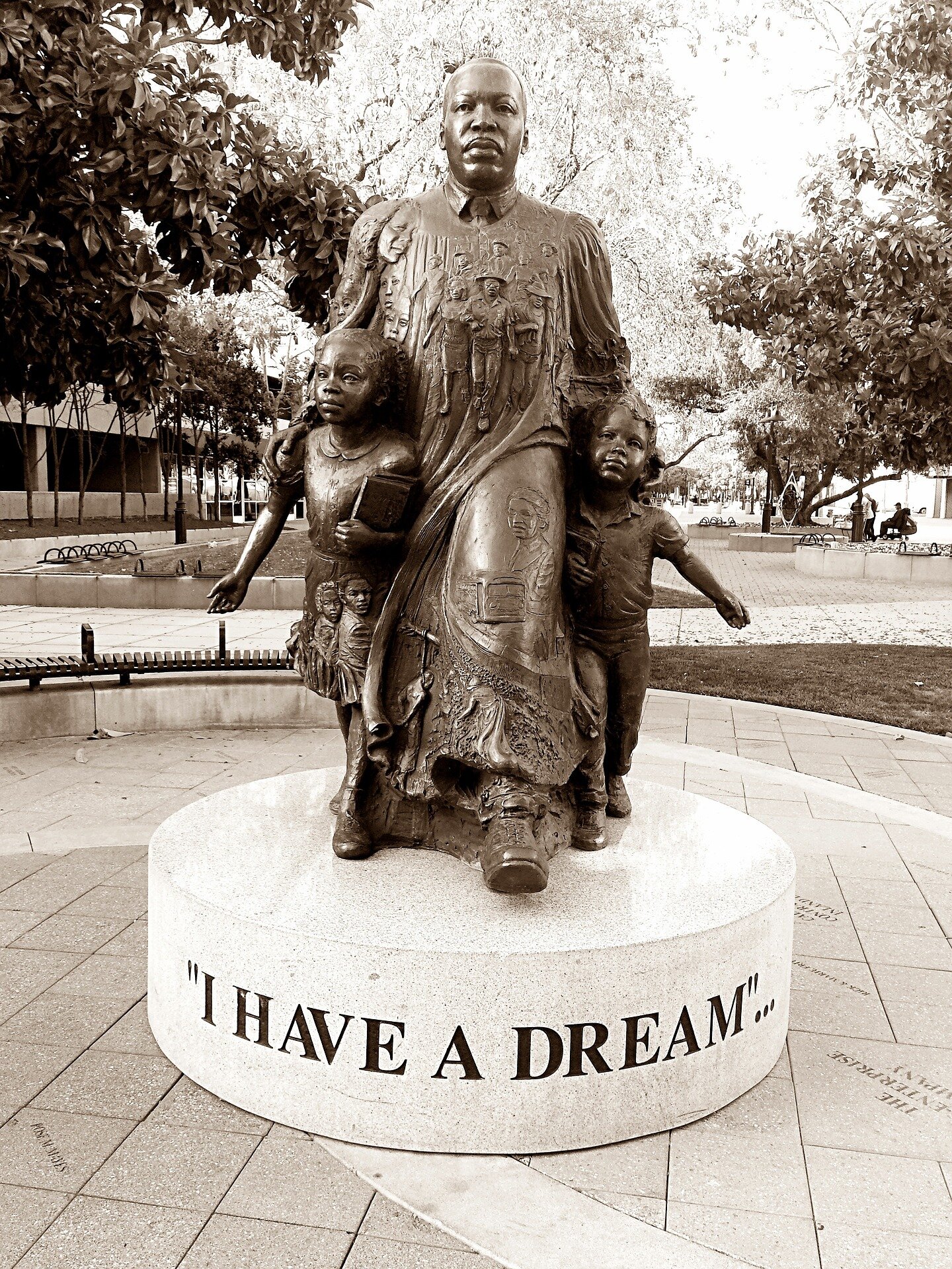 Martin Luther King I Have a Dream statue with two small children.