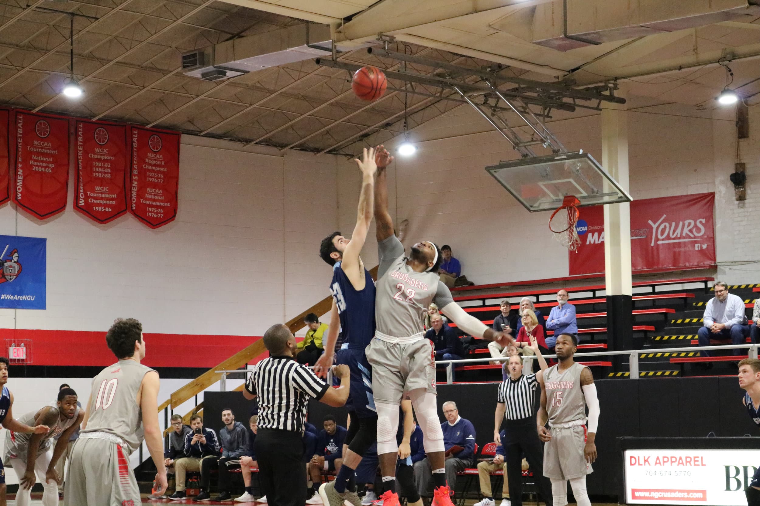 Senior Roderick Howell (22) jumps for the tip off against the Bob Jones University Bruins.