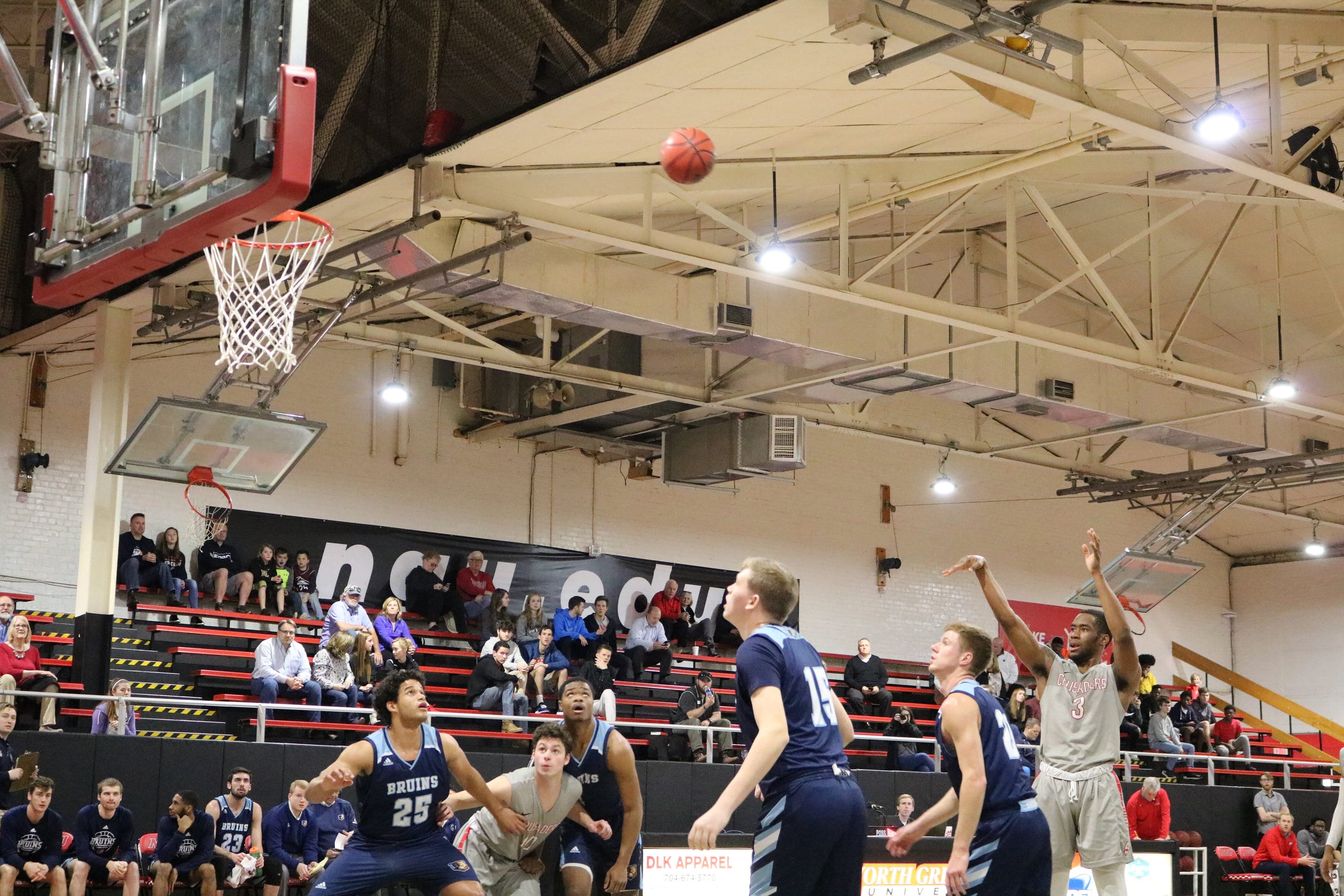 Sophomore Kovi Tate (3) shoots a free throw in he first half of the game.