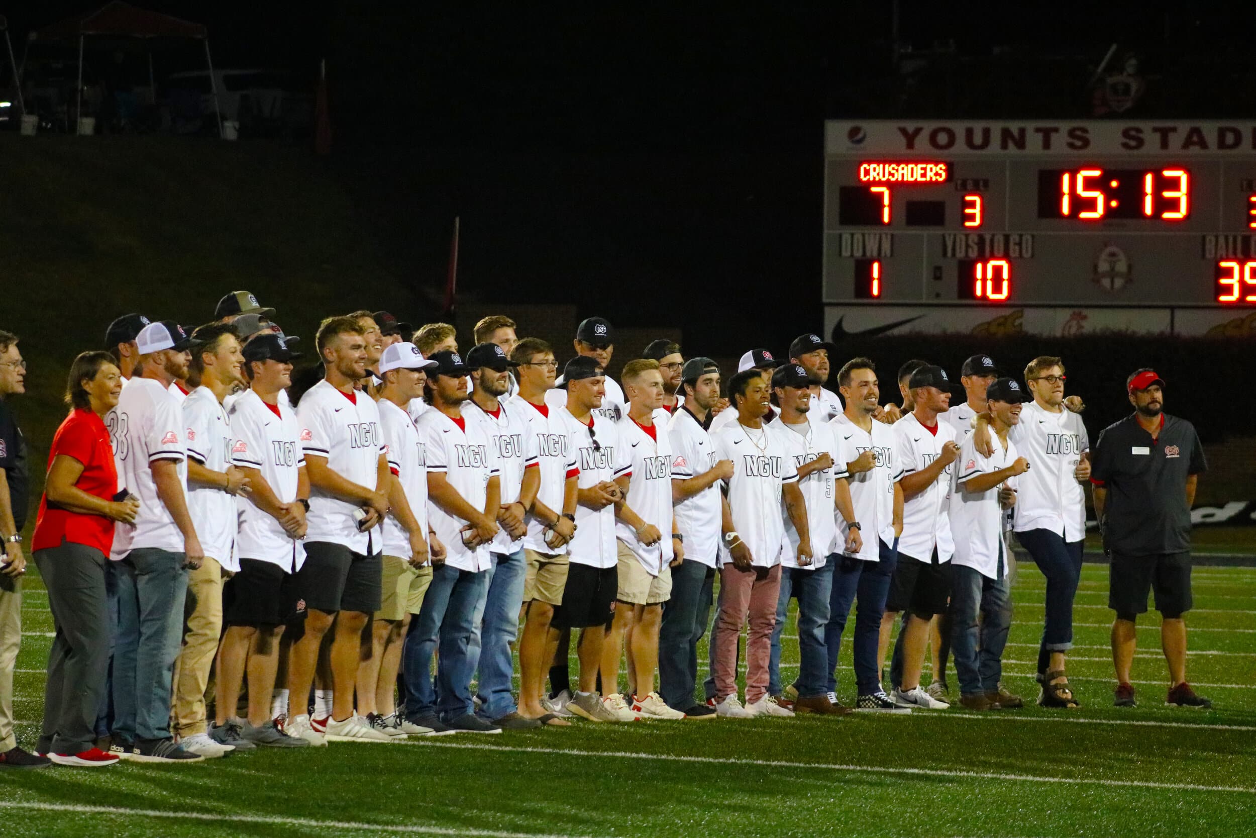 The 2018-2019 Mens Baseball team lining up for a picture with their rings after they were recognized for their championship win this past spring as the Conference Carolinas champions.