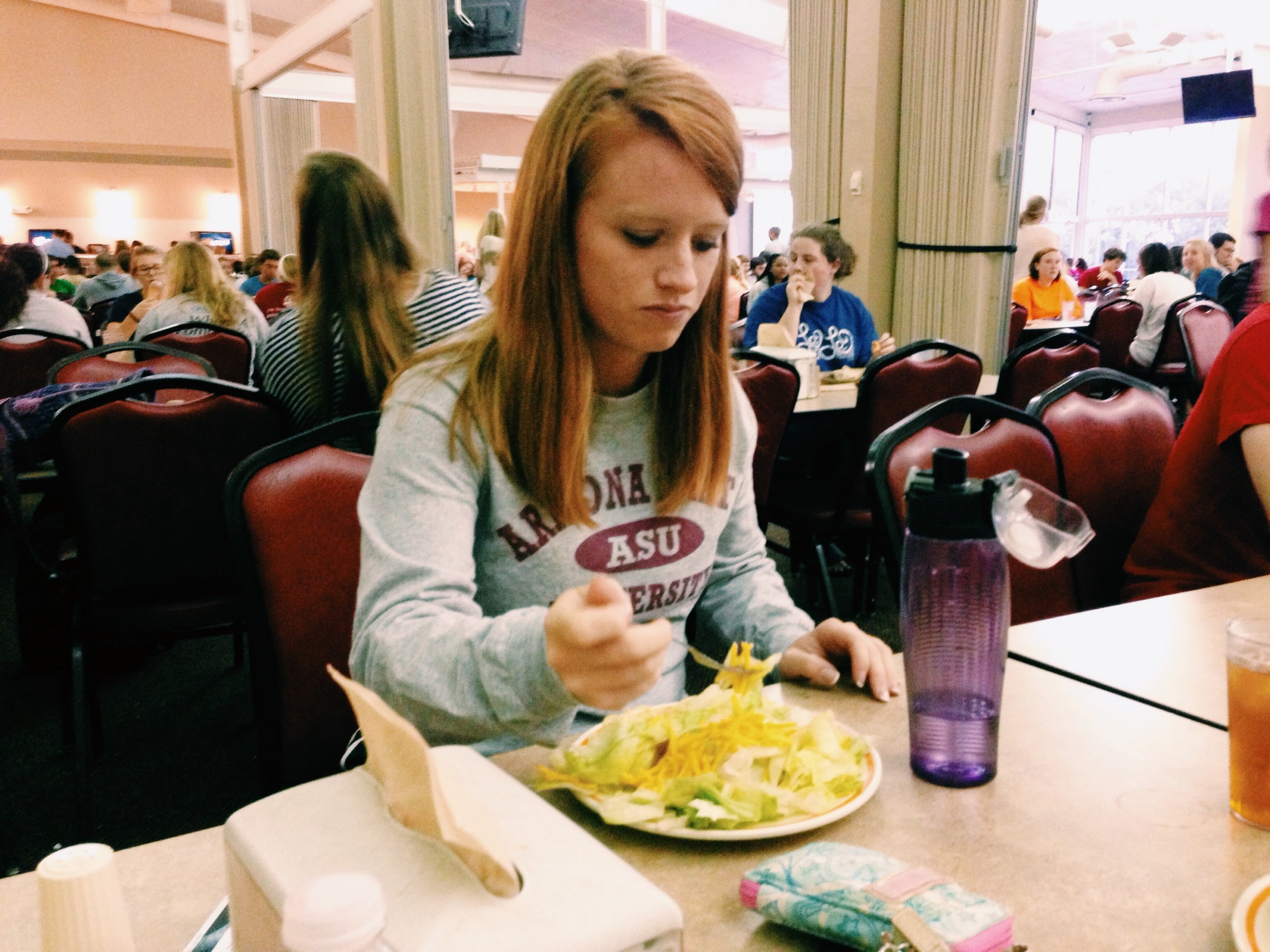  Kaitlyn digs in and is happy with her choice of food. 