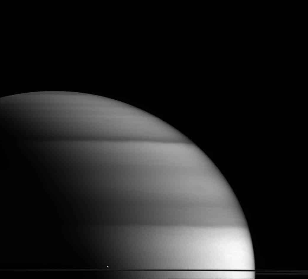 2. The Dew Drop of SaturnA tiny white spec compared to Saturn, Enceladus is the planets 6th largest moon.