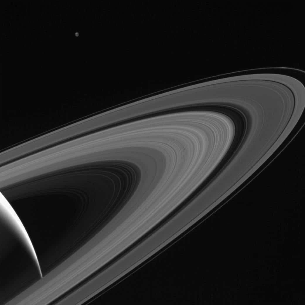 4. Saturn-lit TethysThe sun beautifully reflects off Tethys' rings, another one of Saturn's moons.