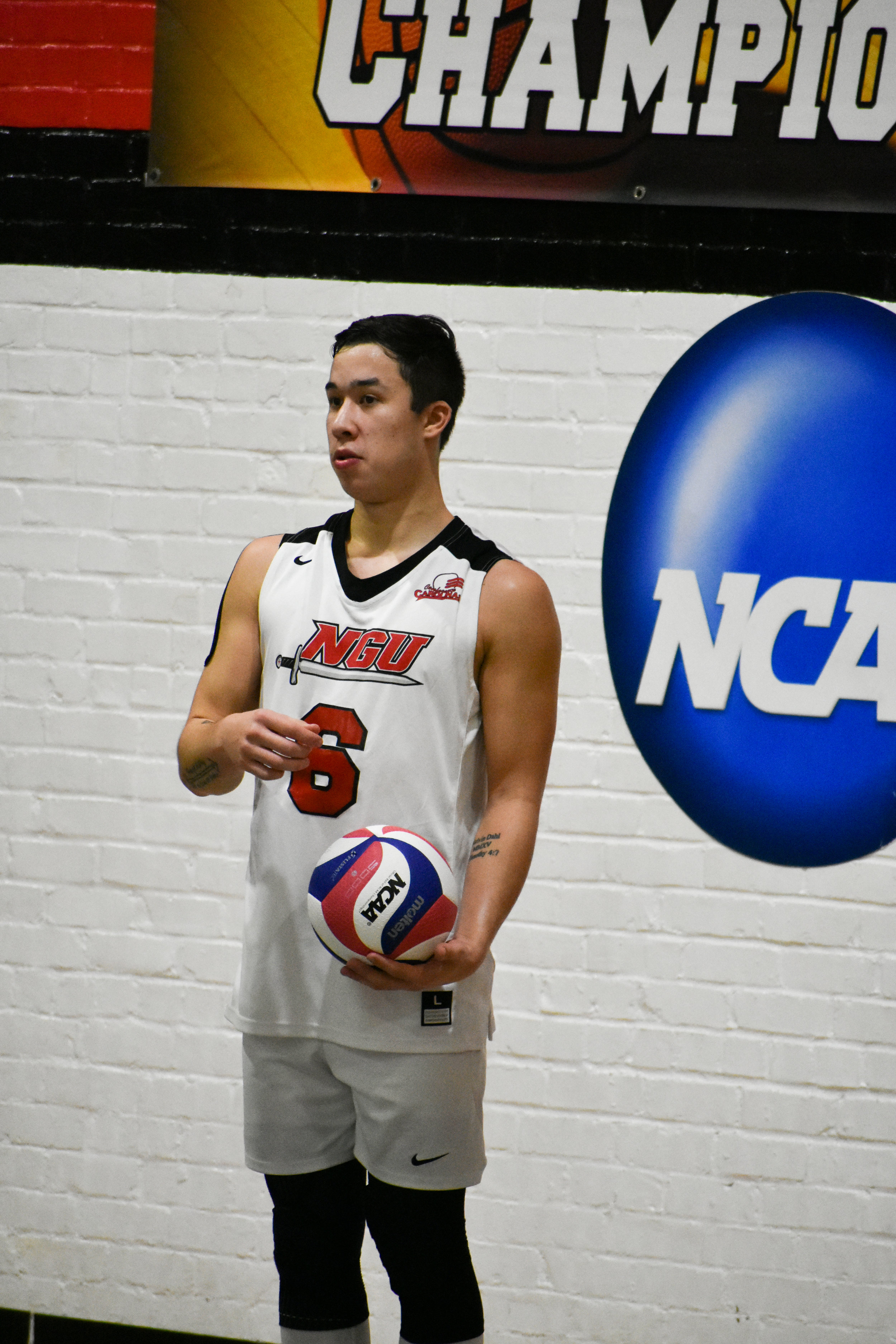 Junior Jake Boldog (6) is setting up the ball so he can spike it.