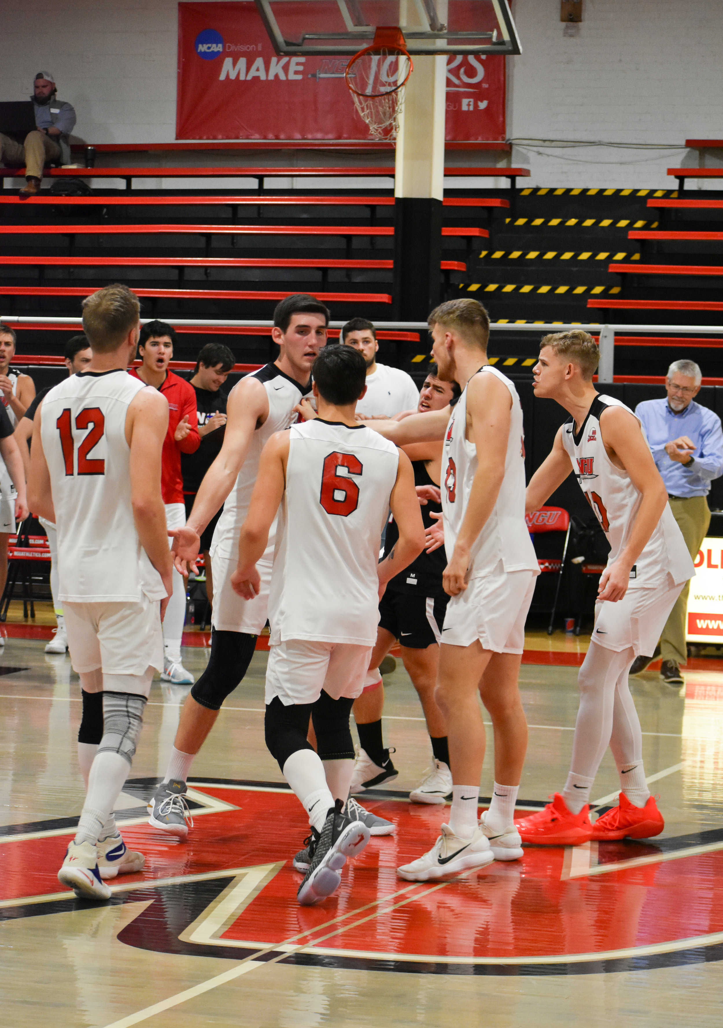 The team celebrates mid-game because they scored a point.