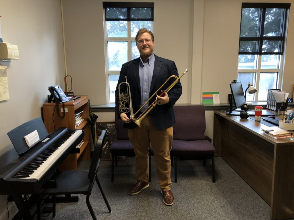 Playing a new tune: Meet new music professor Robbie Collins