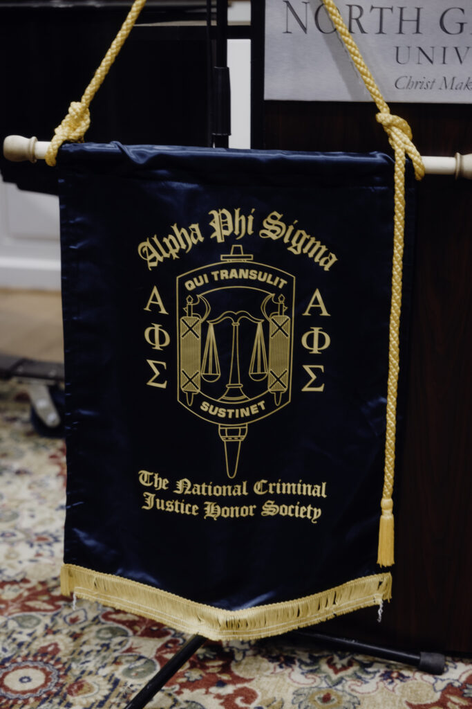 Honoring achievement: Alpha Phi Sigma criminal justice induction ceremony